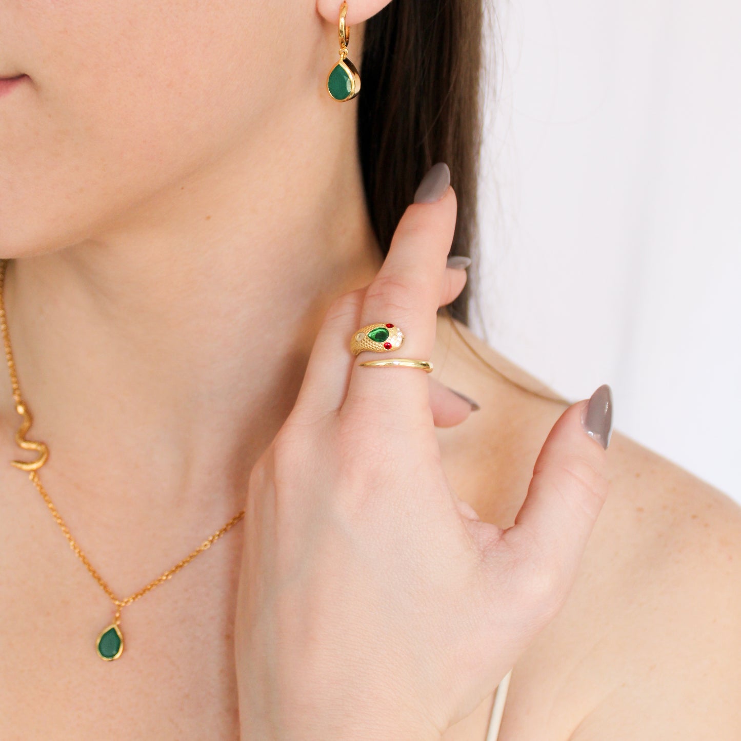 Queen Victoria snake ring in 18k gold vermeil on model hand, lifestyle shot, Ether Jewelry