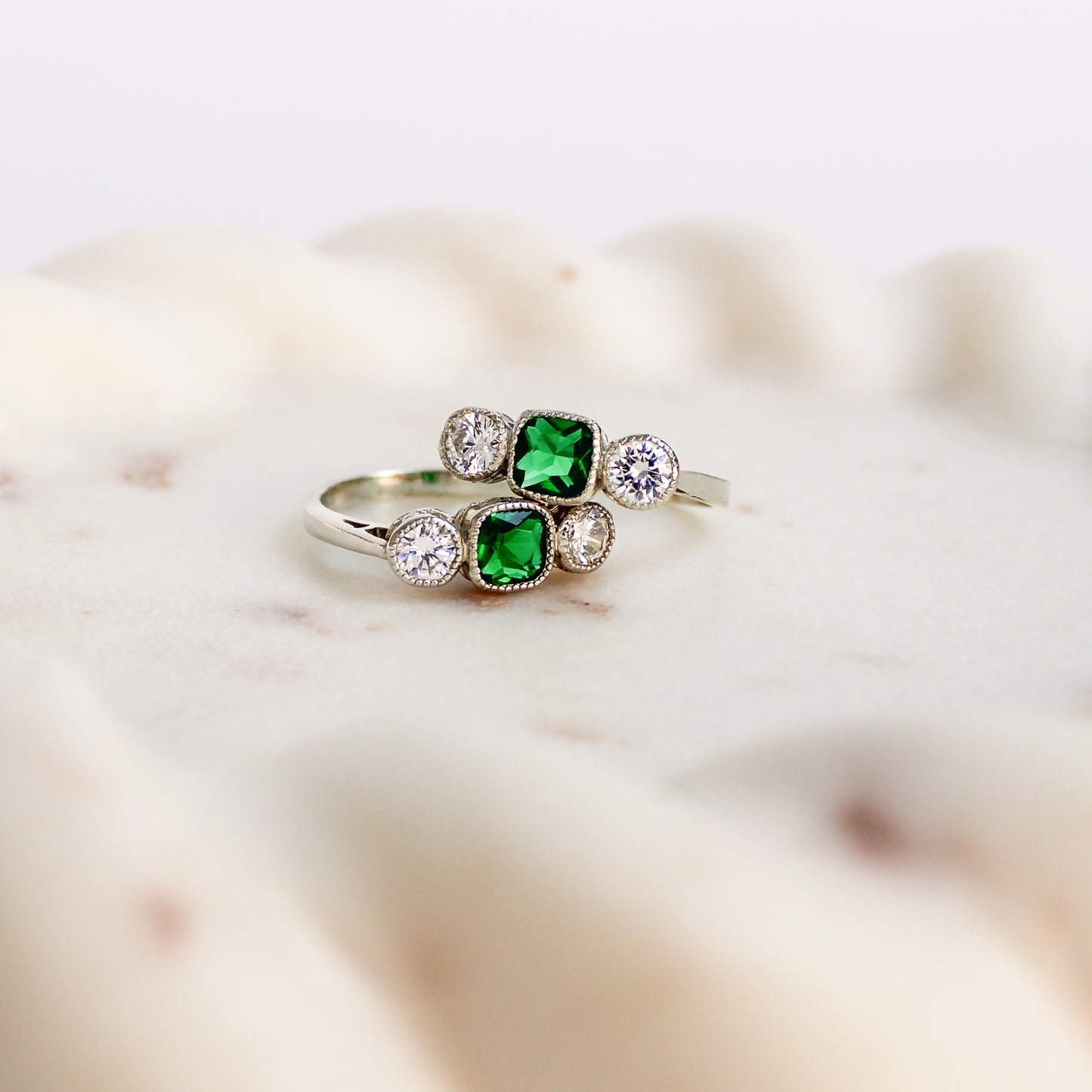 Edwardian Three Stone sterling silver ring stacked on stone tray, Ether Jewelry