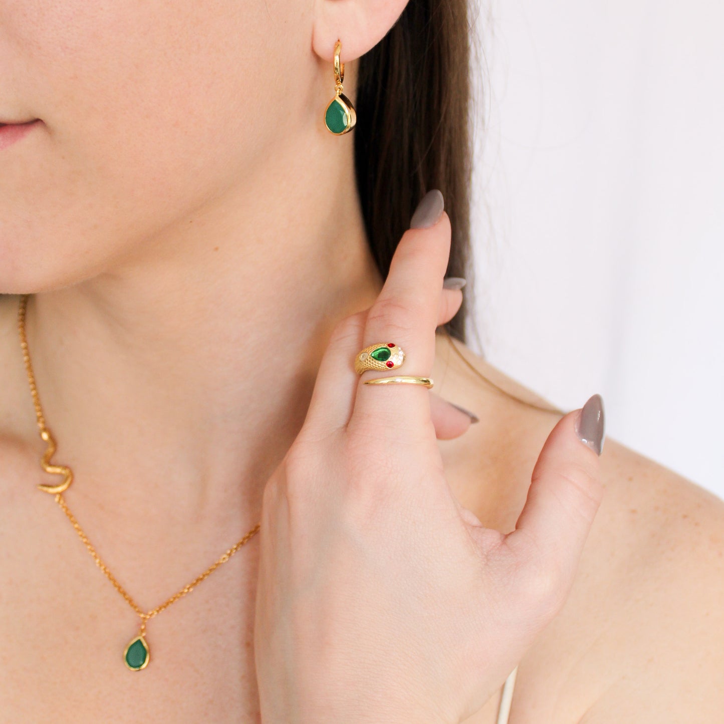Queen Victoria snake ring in 18k gold vermeil on model hand, lifestyle shot, Ether Jewelry