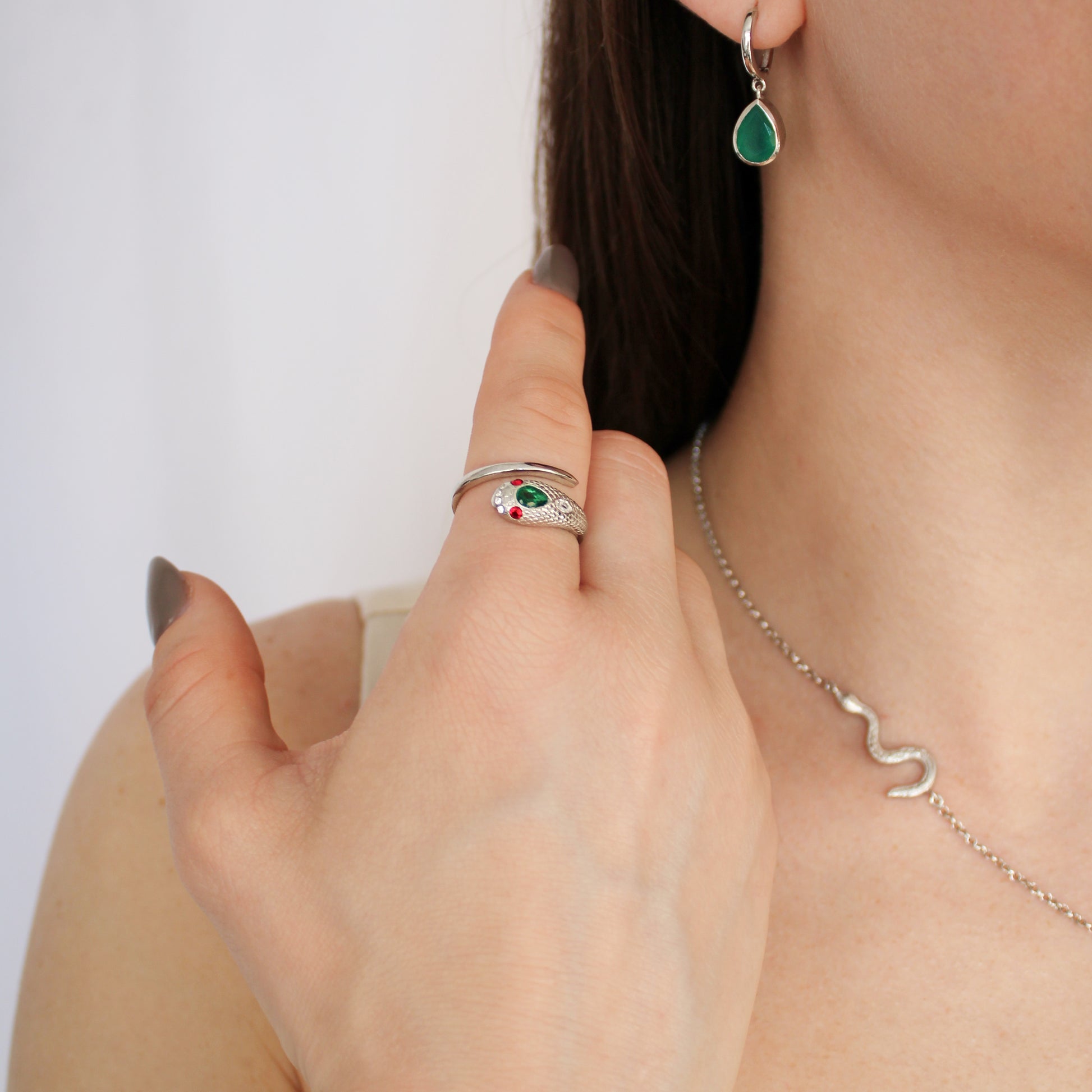 Queen Victoria snake ring in sterling silver on model hand, lifestyle shot, Ether Jewelry
