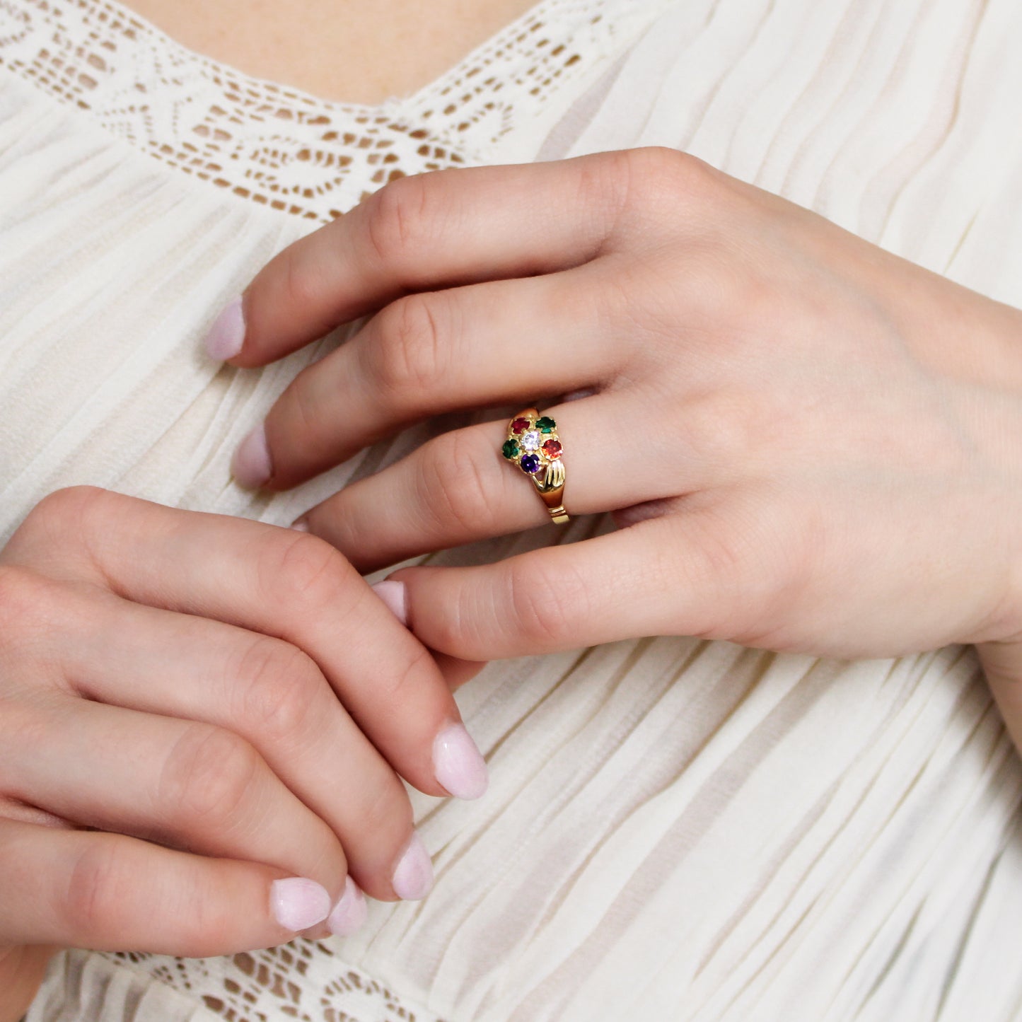 Regard Bloom Ring 18k gold vermeil on model holding hand wearing ring, REGARD acrostic floral jewelry, Ether Jewelry