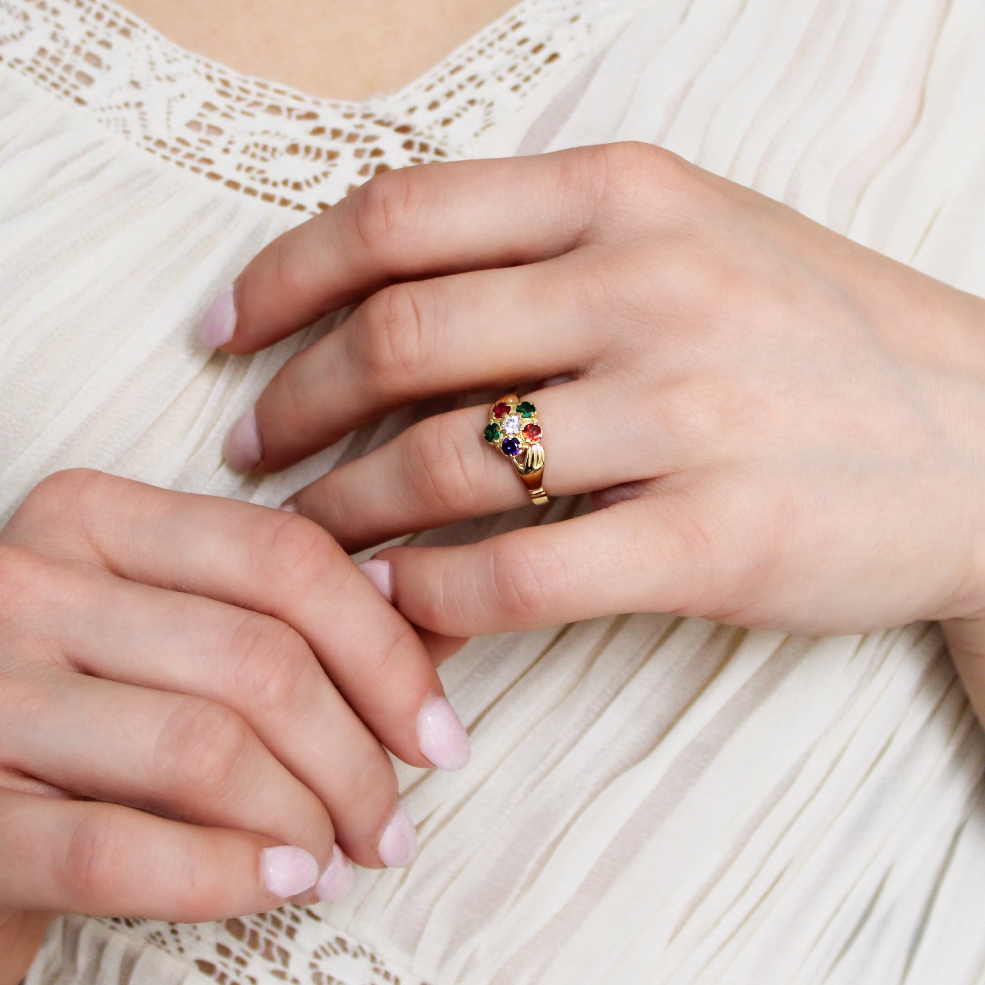 Regard Bloom Ring 18k gold vermeil on model holding hand wearing ring, REGARD acrostic floral jewelry, Ether Jewelry