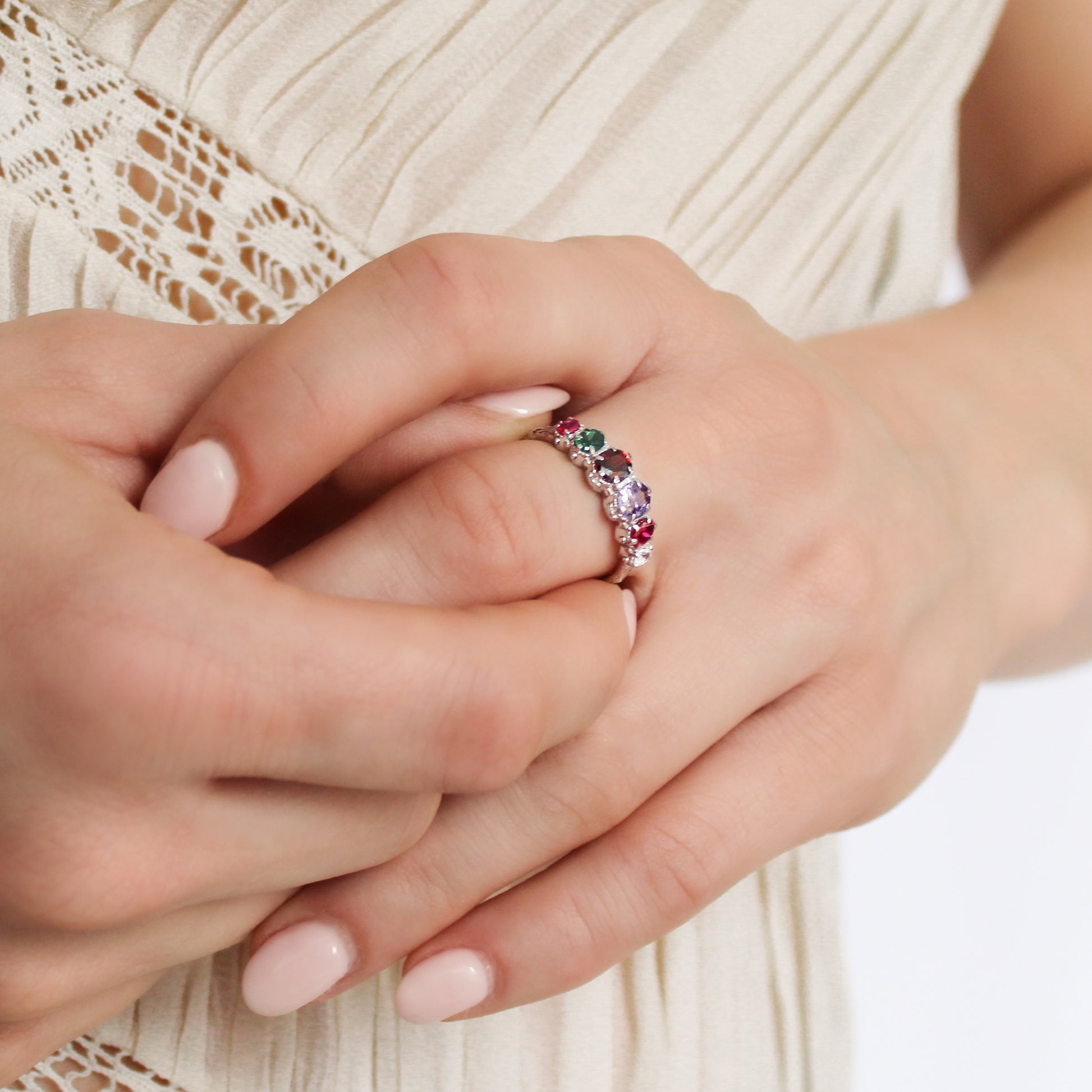 "Crowned Jewel Ring sterling silver on model holding ring, REGARD acrostic oval CZ jewelry, Ether Jewelry