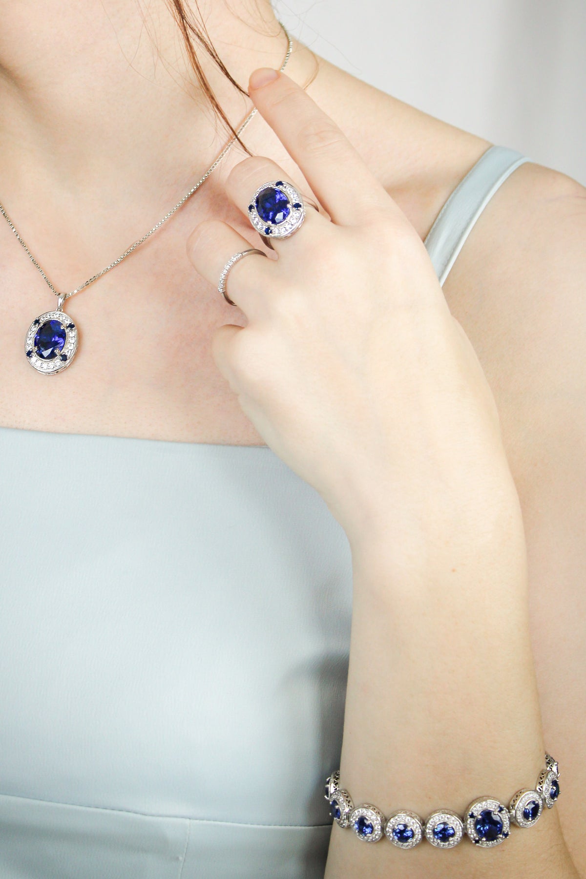 Silver Halo Bracelet styled on model’s wrist catching natural light — luminous and graceful, Ether Jewelry