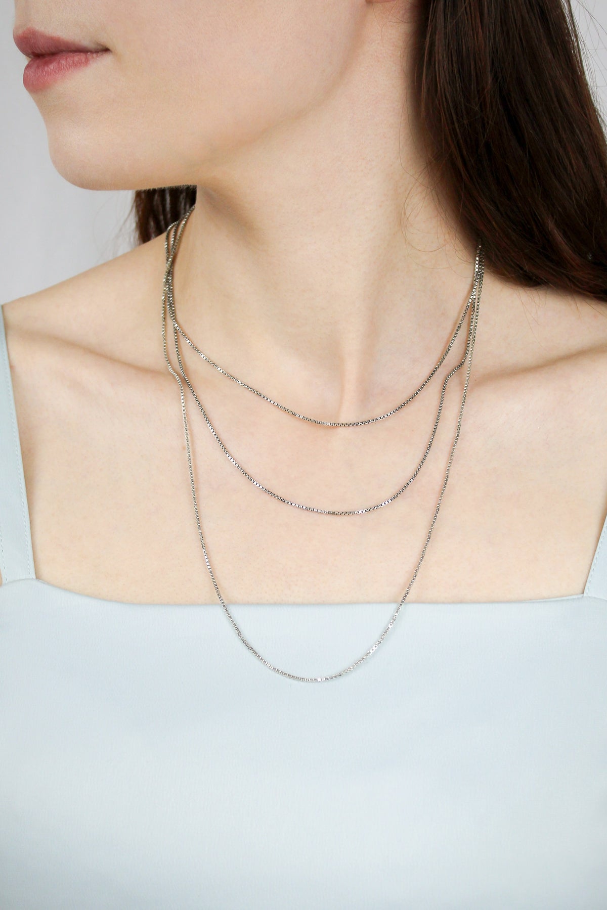 Silver Chain Necklace styled on model layered subtly for modern sophistication, Ether Jewelry
