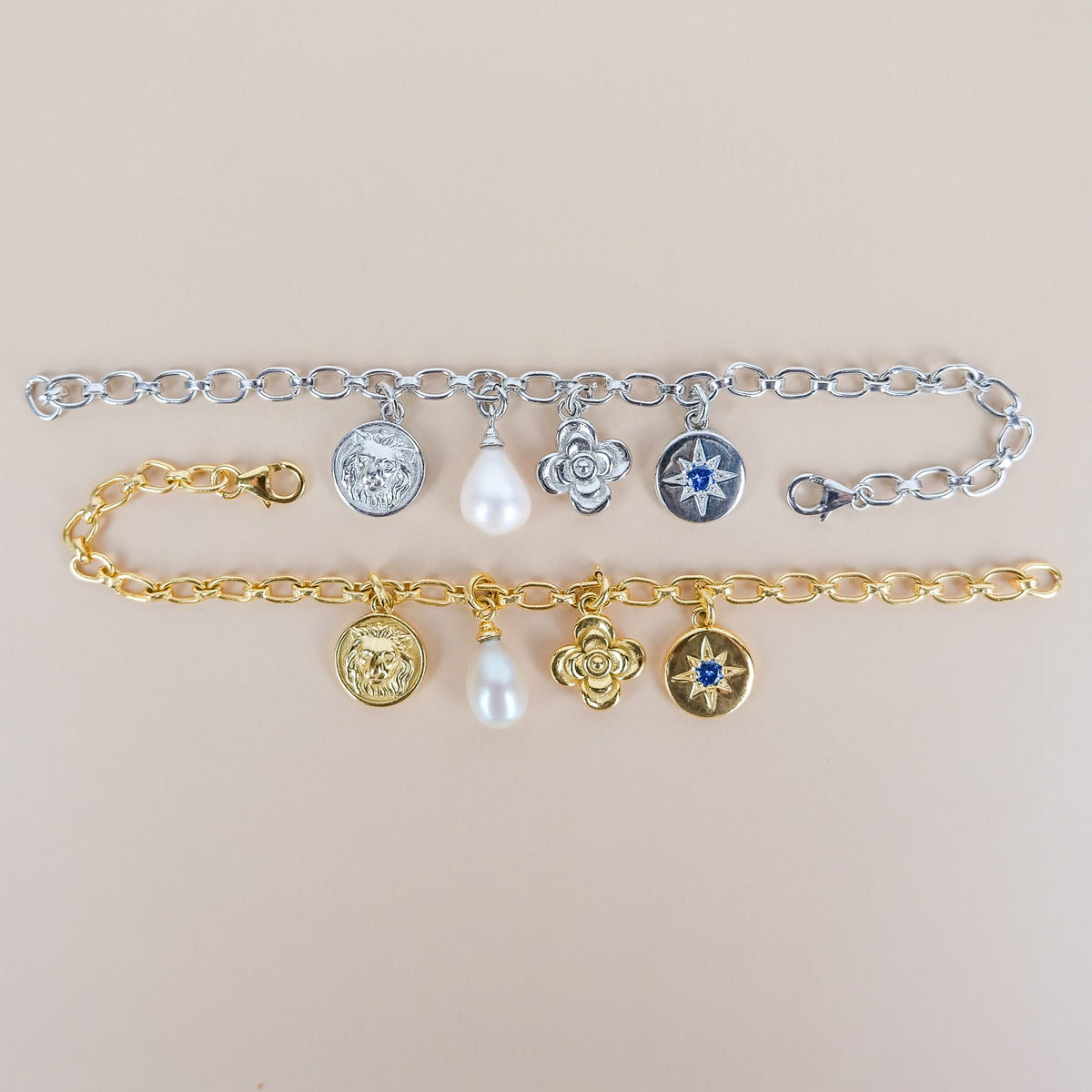Archivist Bracelet sterling silver and gold vermeil both bracelets on beige background, multi-charm oval link bracelet, Ether Jewelry