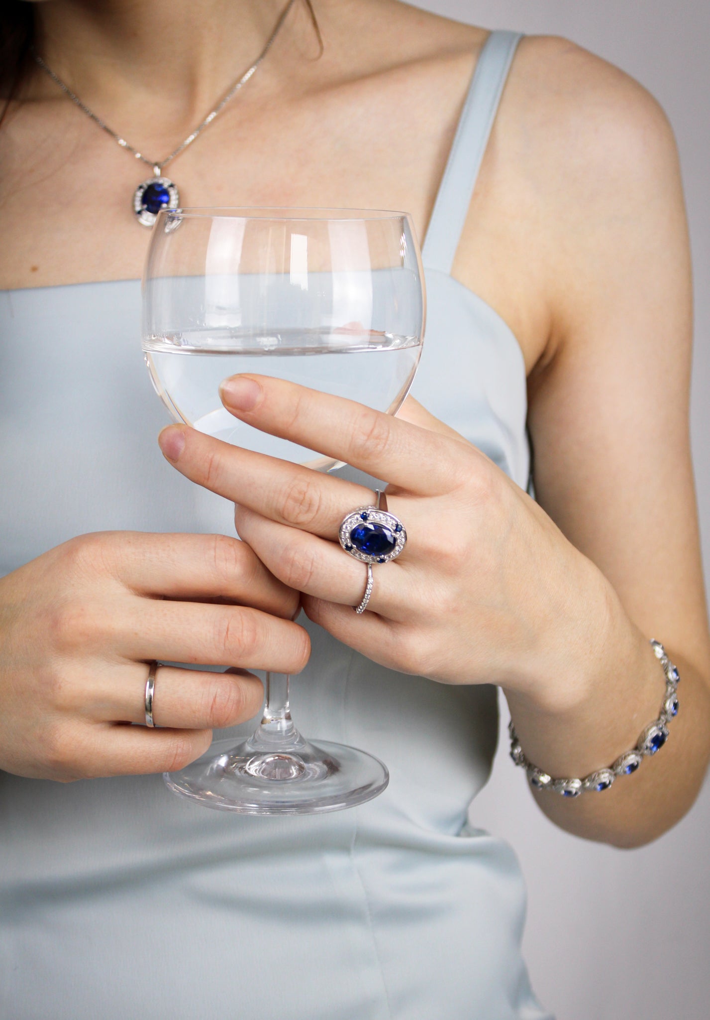 Silver Halo Bracelet styled on model’s wrist catching natural light — luminous and graceful.