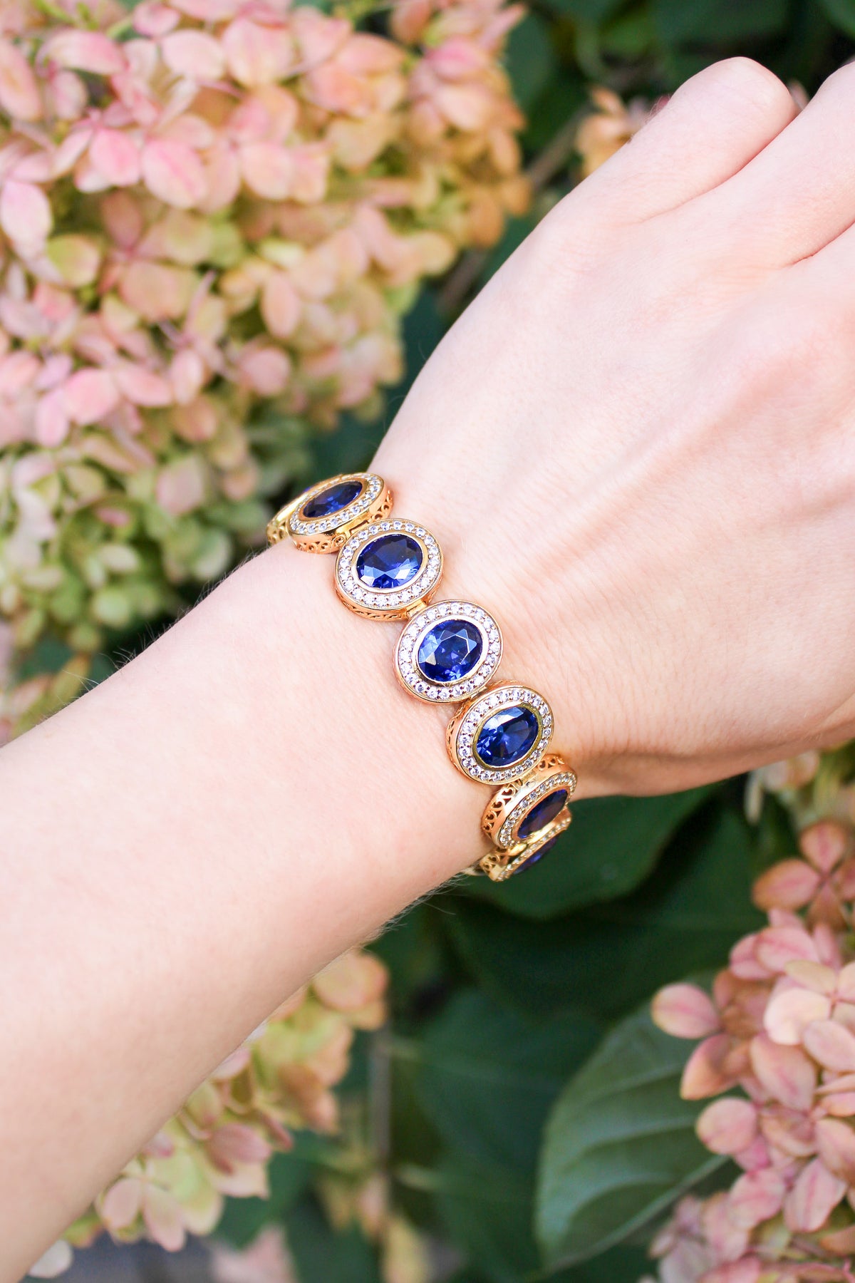 Detailed macro of gold Halo Bracelet showing fine craftsmanship and radiant halo stations, Ether Jewelry