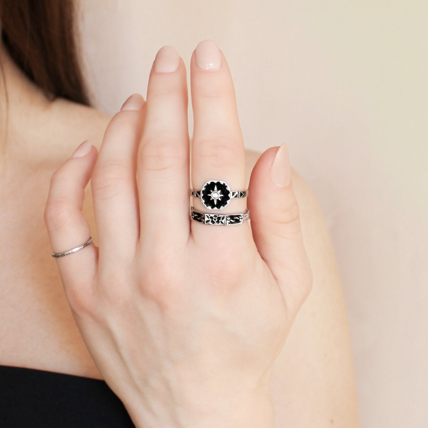 Sterling silver Nocturne ring stacked with another black floral ring, Ether Jewelry