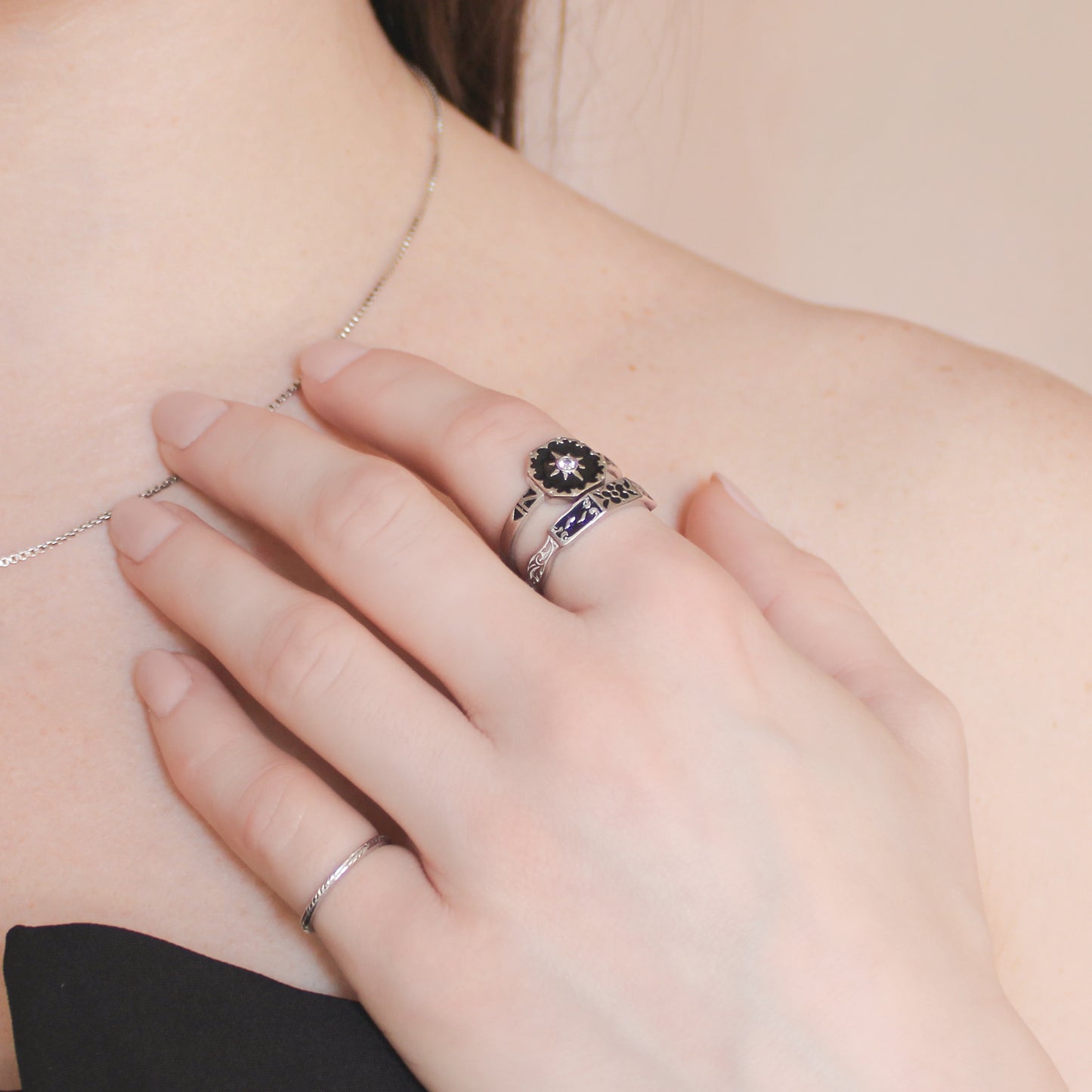Nocturne ring in sterling silver stacked with another ring, styled with touch necklace, Ether Jewelry