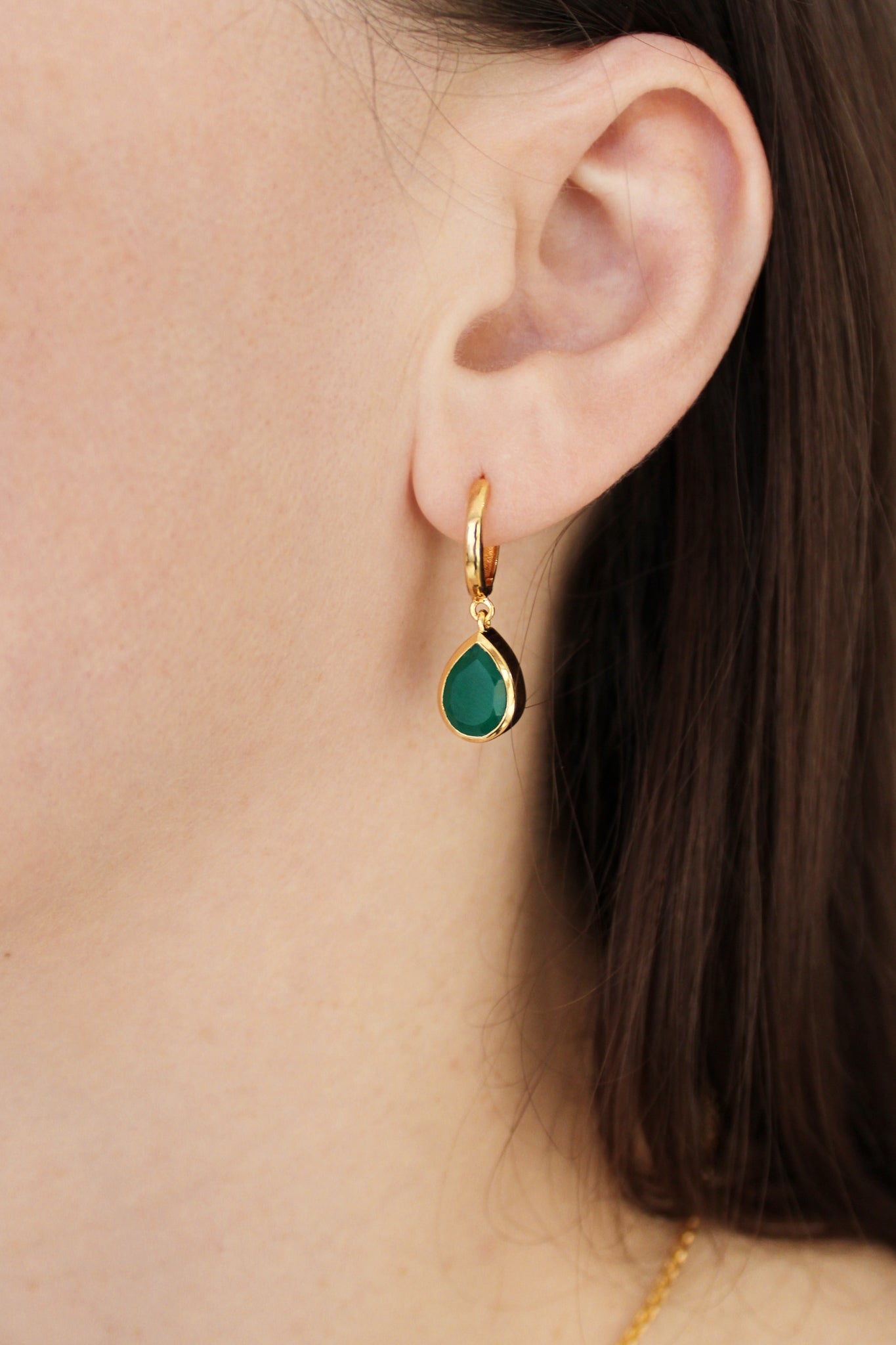 18k gold vermeil Devoted Earrings close-up on model, bezel-set green onyx teardrop drop detail, Ether Jewelry