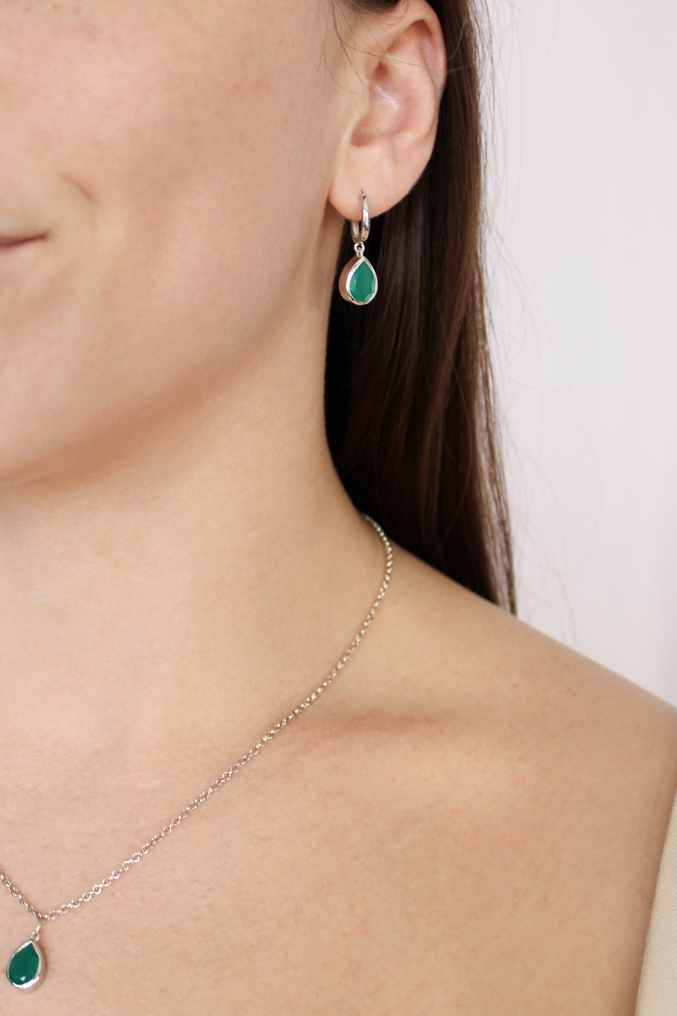 Devoted sterling silver earrings and necklace worn together on model, green onyx serpent jewelry set, Ether Jewelry