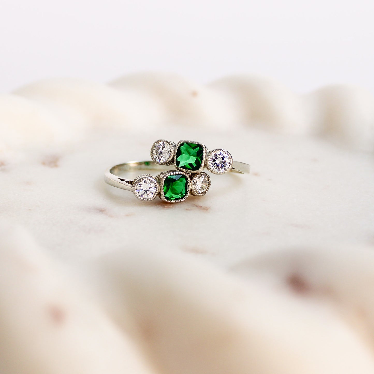 Edwardian Three Stone sterling silver ring stacked on stone tray, Ether Jewelry