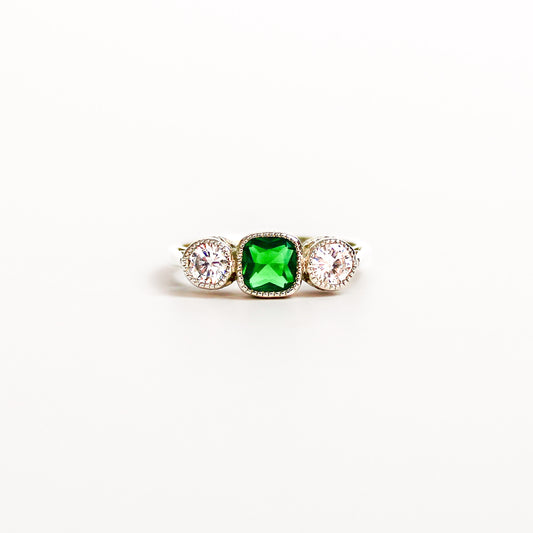 Edwardian Three Stone ring sterling silver, emerald and diamond, filigree detail, on white background, ether jewelry