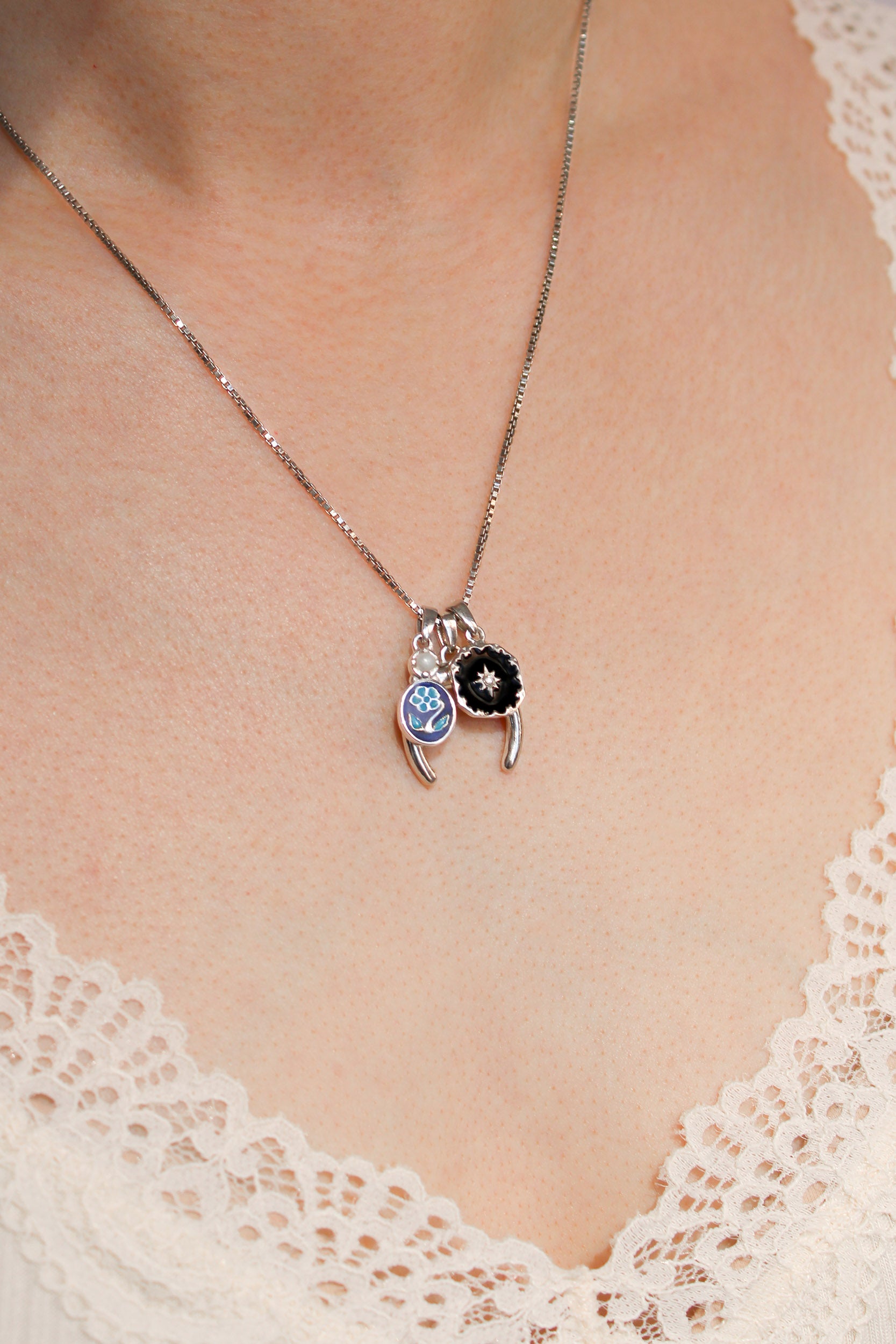 Sterling silver double horn pendant stacked with other victorian pendants on same chain, Ether Jewelry