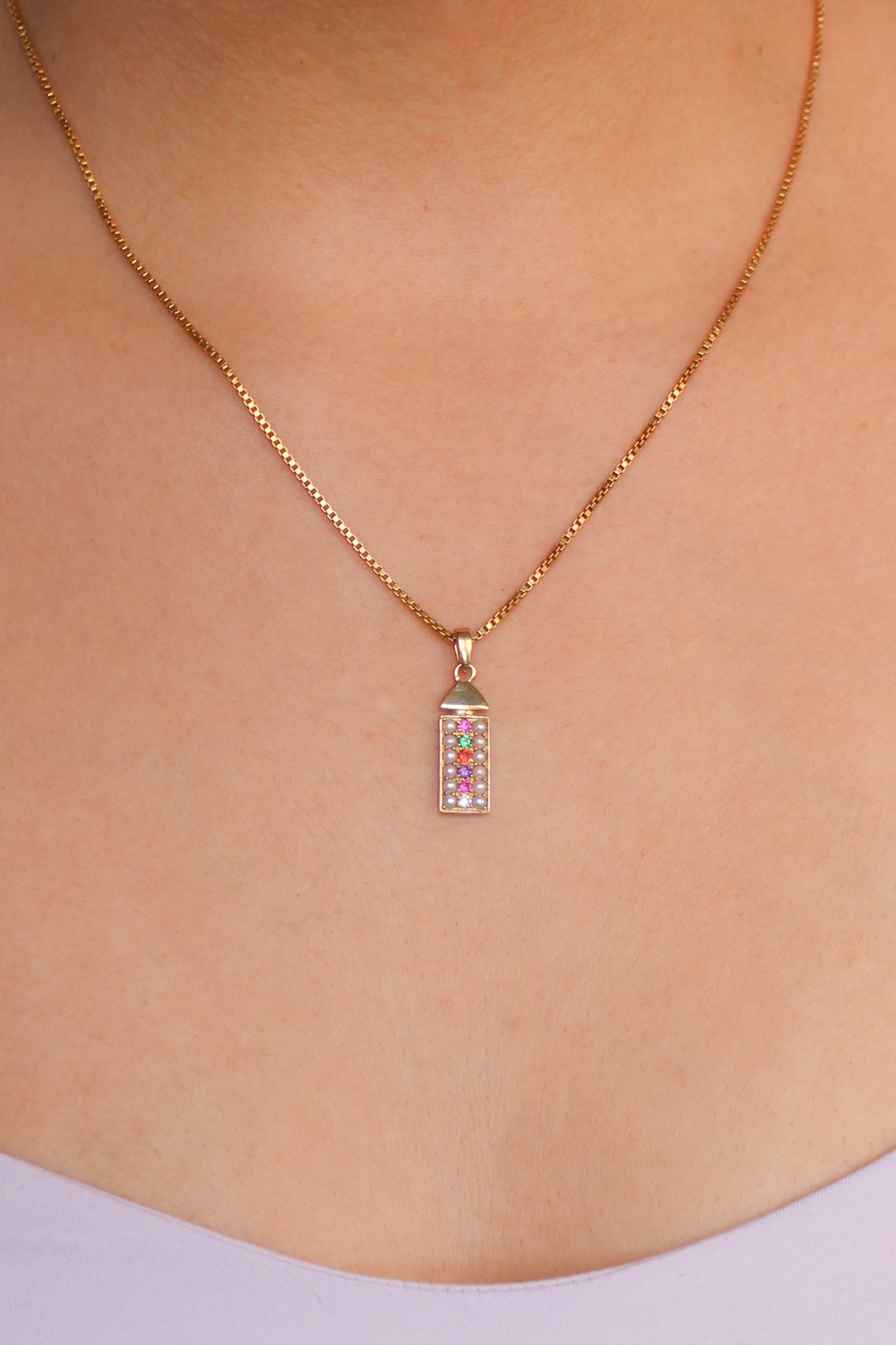 delicate gemstone pendant necklace