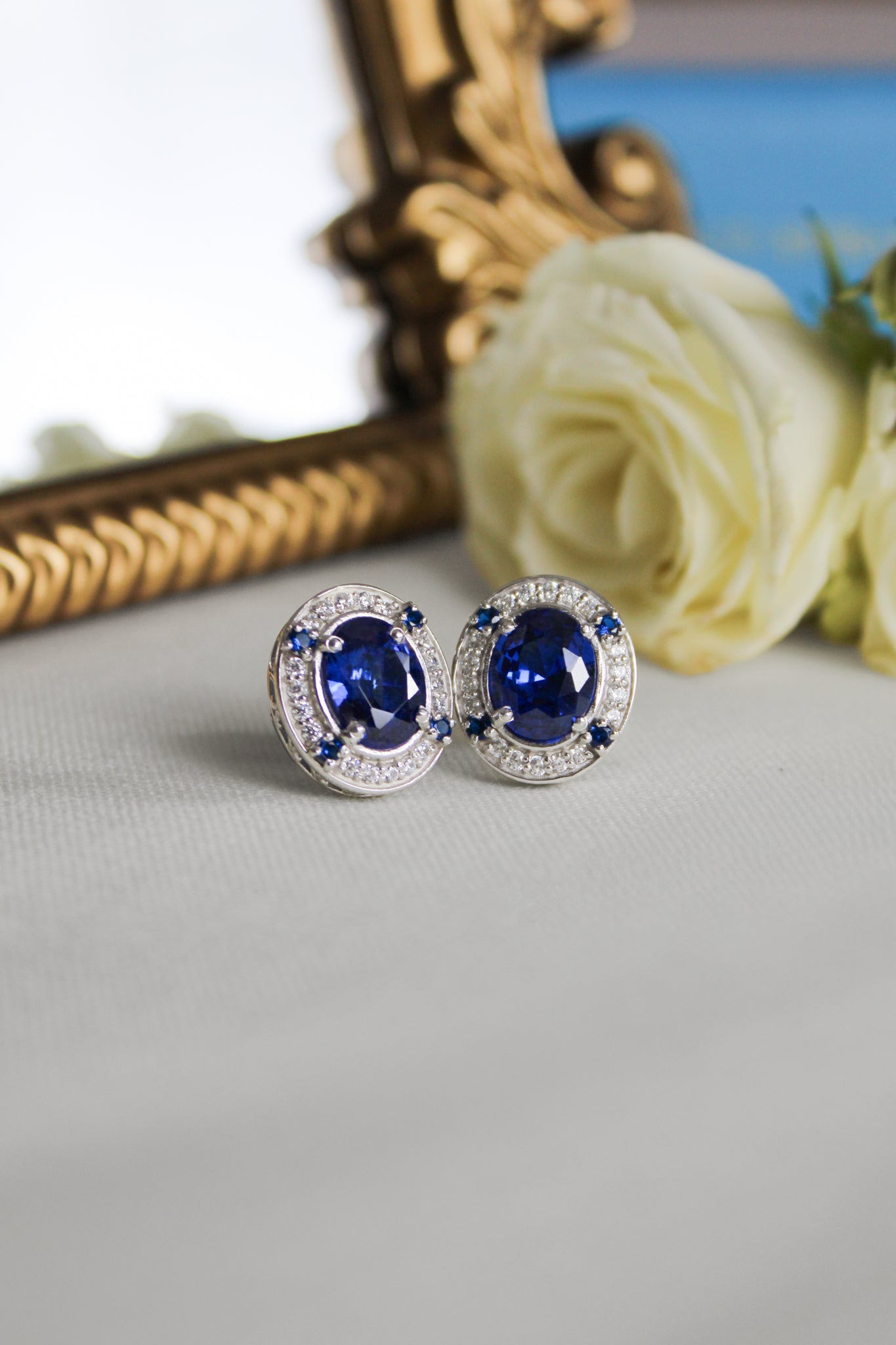 Close-up of silver Sovereign Earrings inspired by Princess Diana’s elegance and enduring legacy.