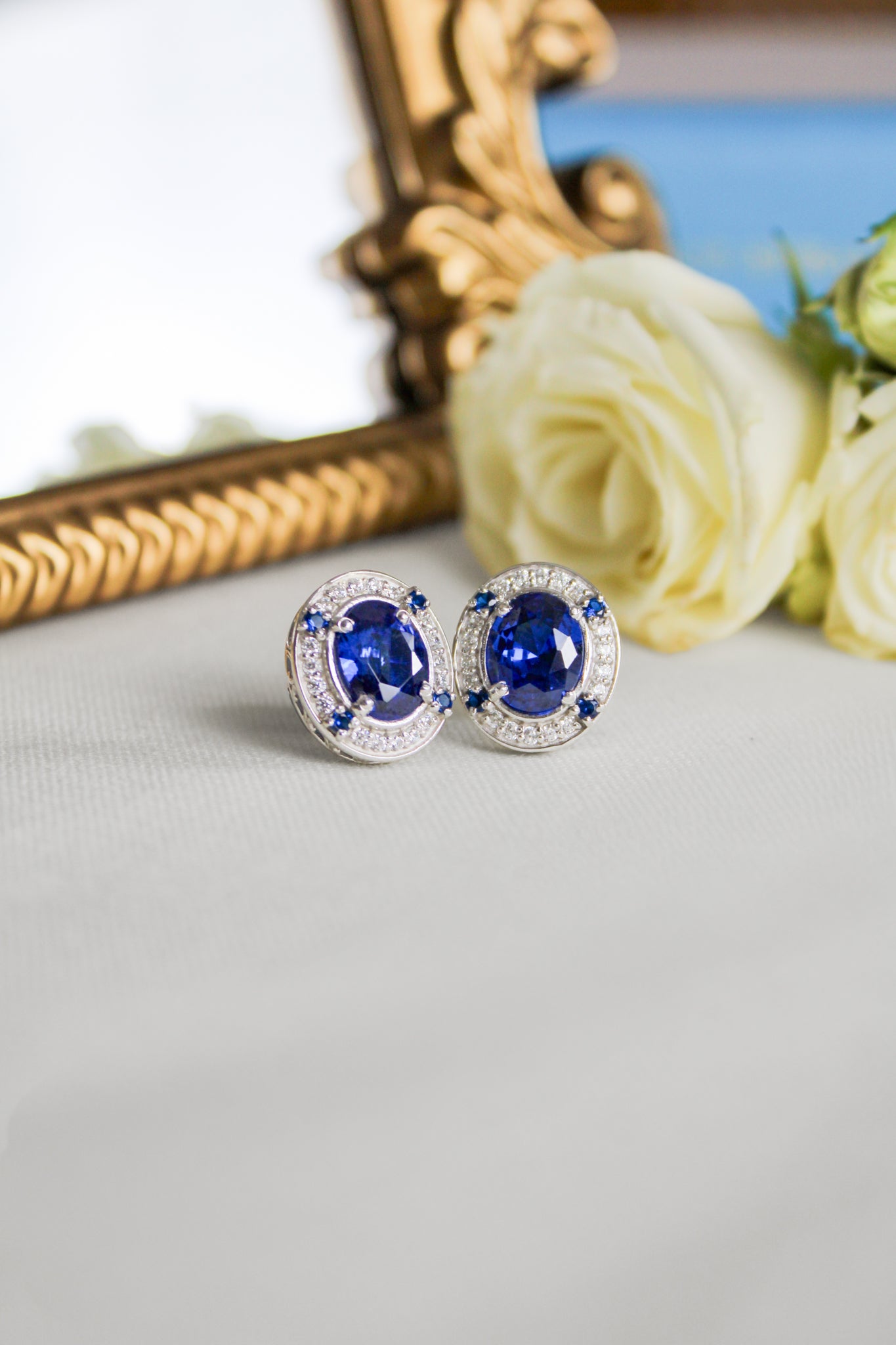 Close-up of silver Sovereign Earrings inspired by Princess Diana’s elegance and enduring legacy, Ether Jewelry