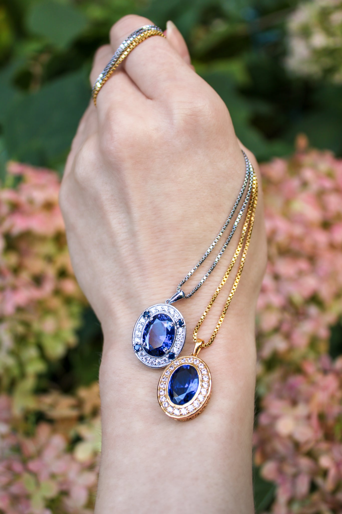 Silver Heartline Necklace by Ether Jewelry with luminous sapphire gemstone on adjustable box chain.