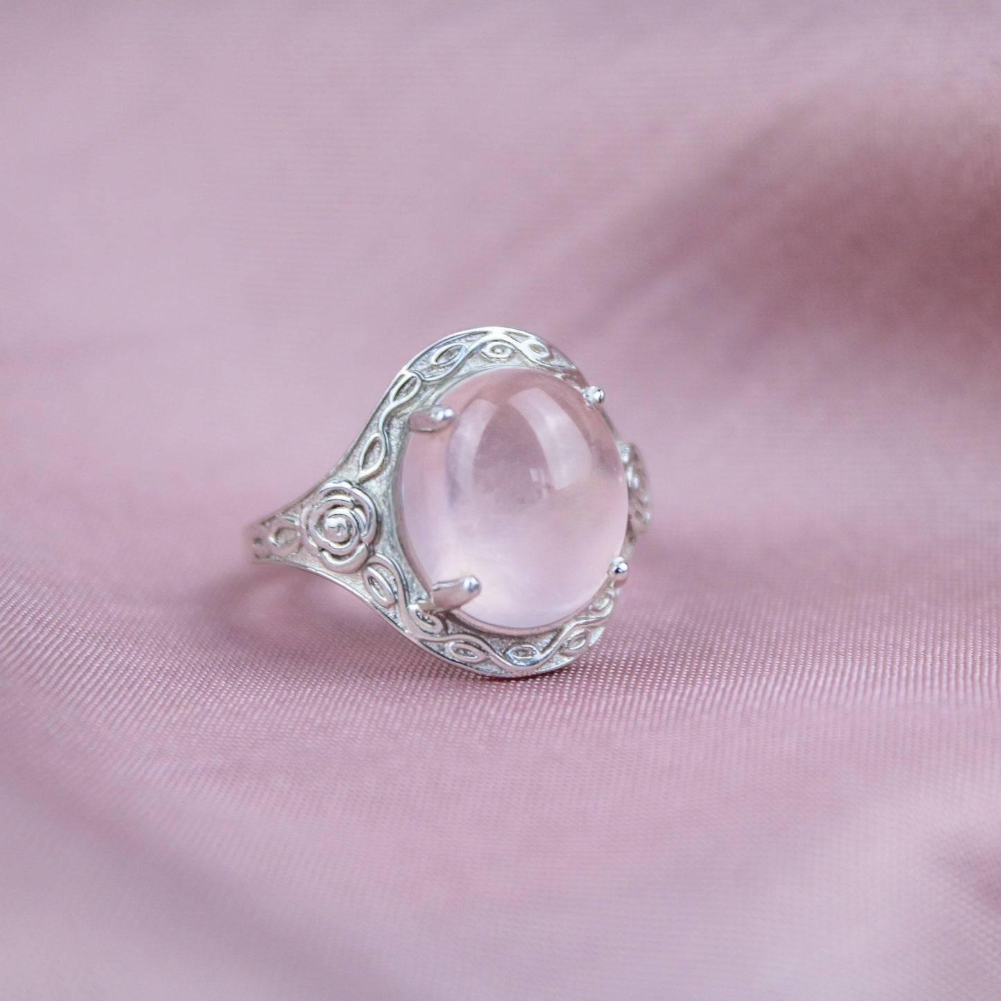 Romantic Heir Ring sterling silver staged on pink fabric, oval rose quartz cabochon filigree ring, Ether Jewelry