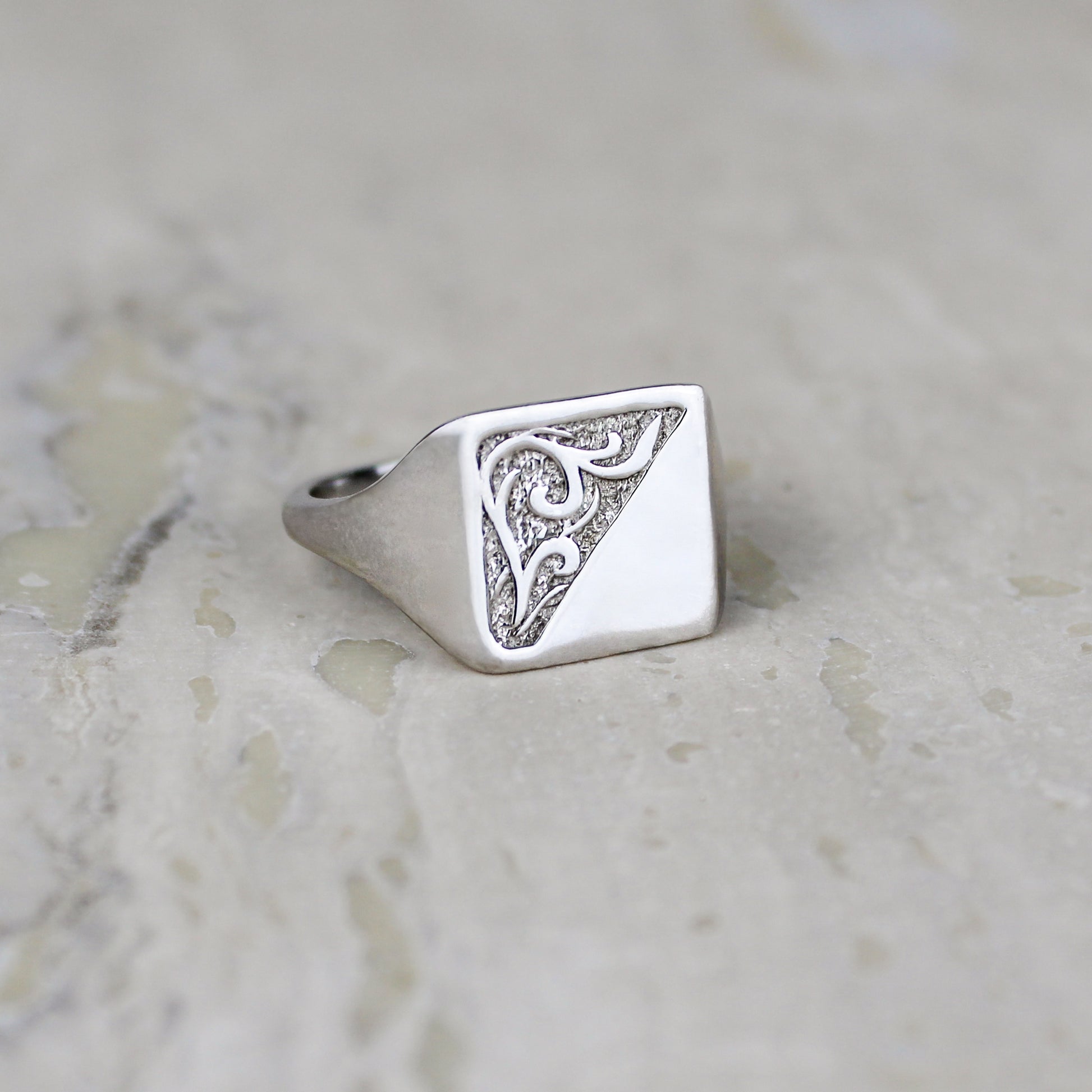 Architect Ring sterling silver staged on marble, square signet ring with diagonal scroll engraving, Ether Jewelry