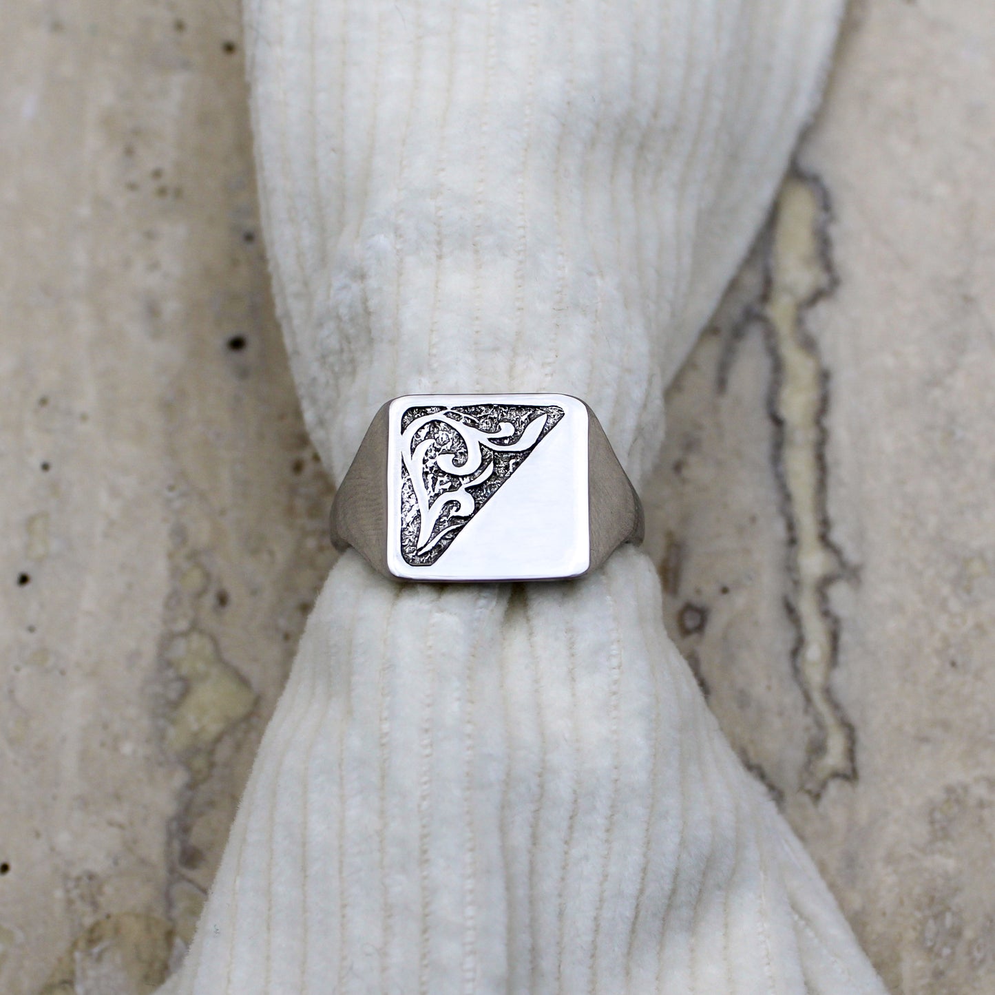 Architect Ring sterling silver slipped over corduroy fabric on marble background, diagonal scroll engraved signet ring, Ether Jewelry
