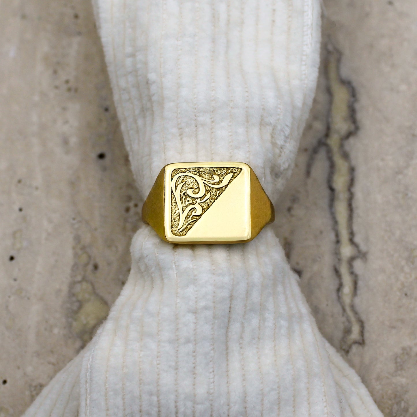 Architect Ring 18k gold vermeil slipped over corduroy fabric on marble background, diagonal scroll engraved signet ring, Ether Jewelry