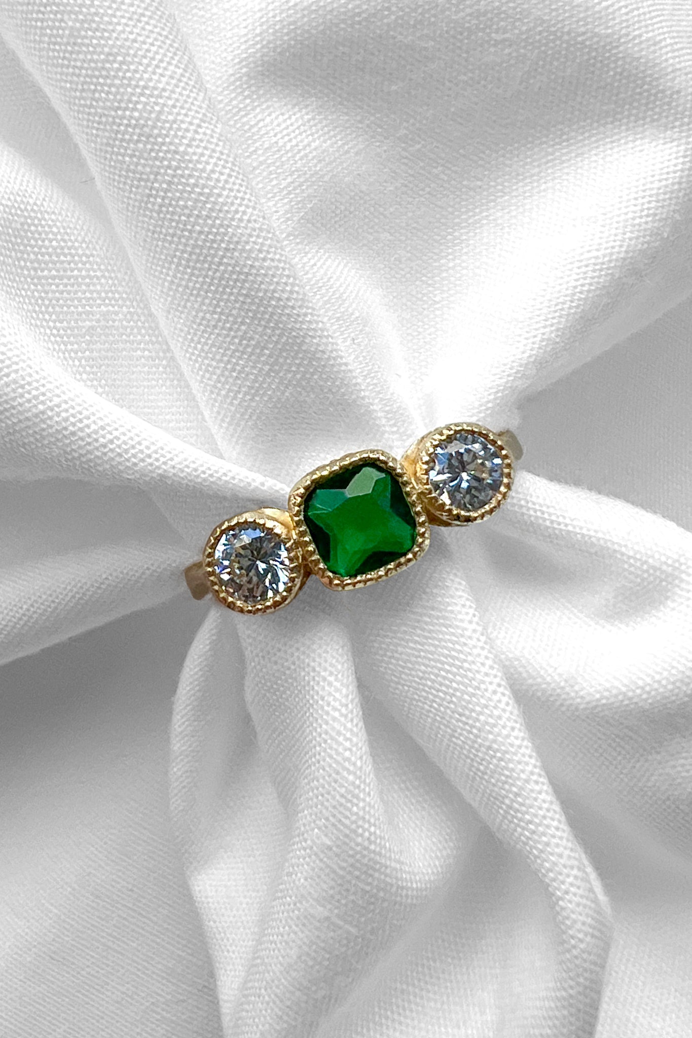 Emerald style gemstone ring gold