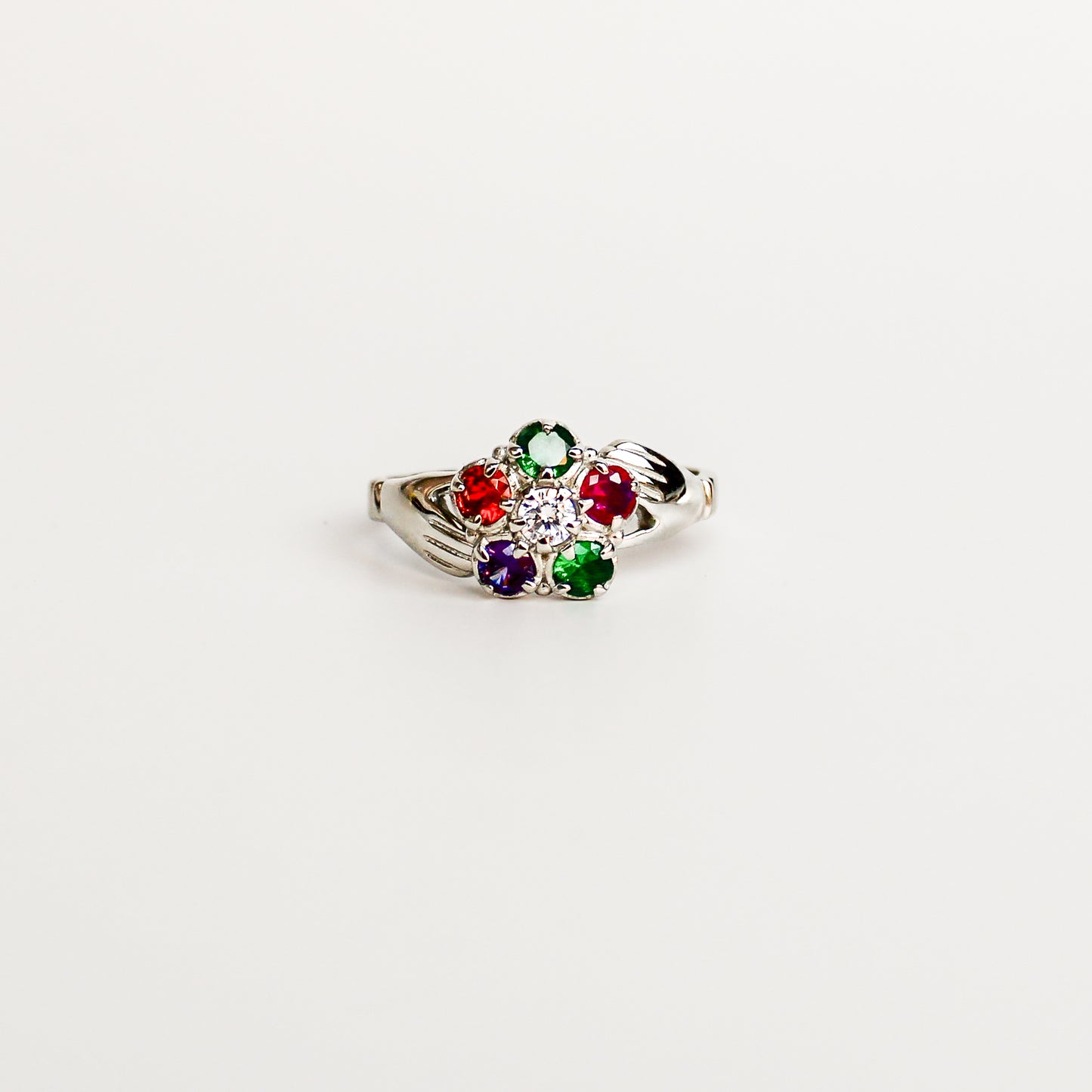 Regard Bloom Ring in sterling silver, acrostic REGARD CZ stones in floral cluster with diamond CZ center, claddagh-inspired band, Ether Jewelry