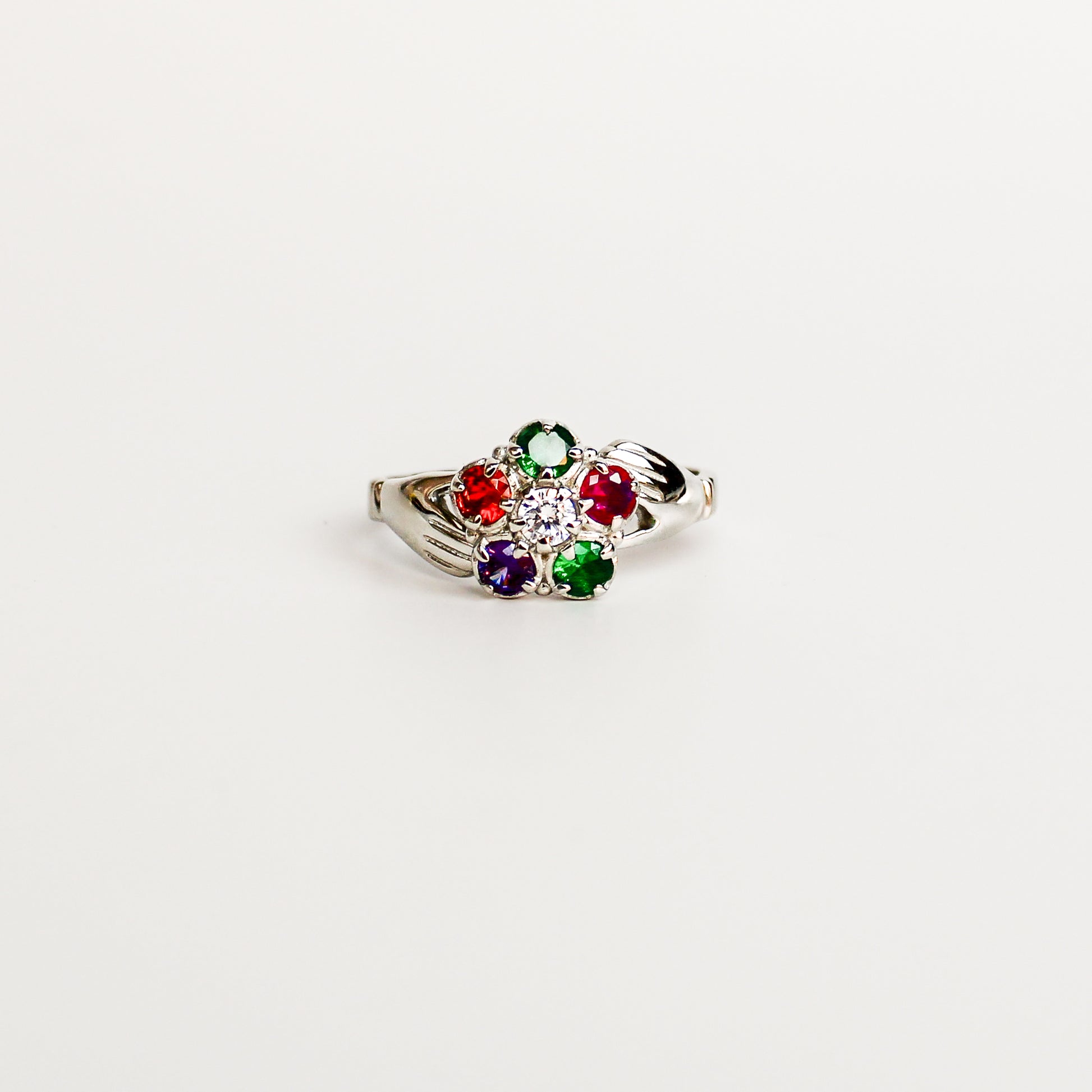 Regard Bloom Ring in sterling silver, acrostic REGARD CZ stones in floral cluster with diamond CZ center, claddagh-inspired band, Ether Jewelry