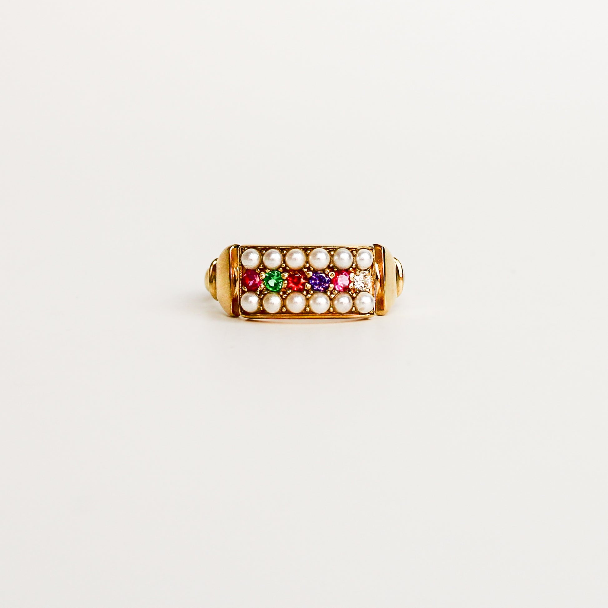 Regent Ring in 18k gold vermeil, acrostic REGARD CZ stones set across cultured pearl-paved rectangular signet face, Ether Jewelry