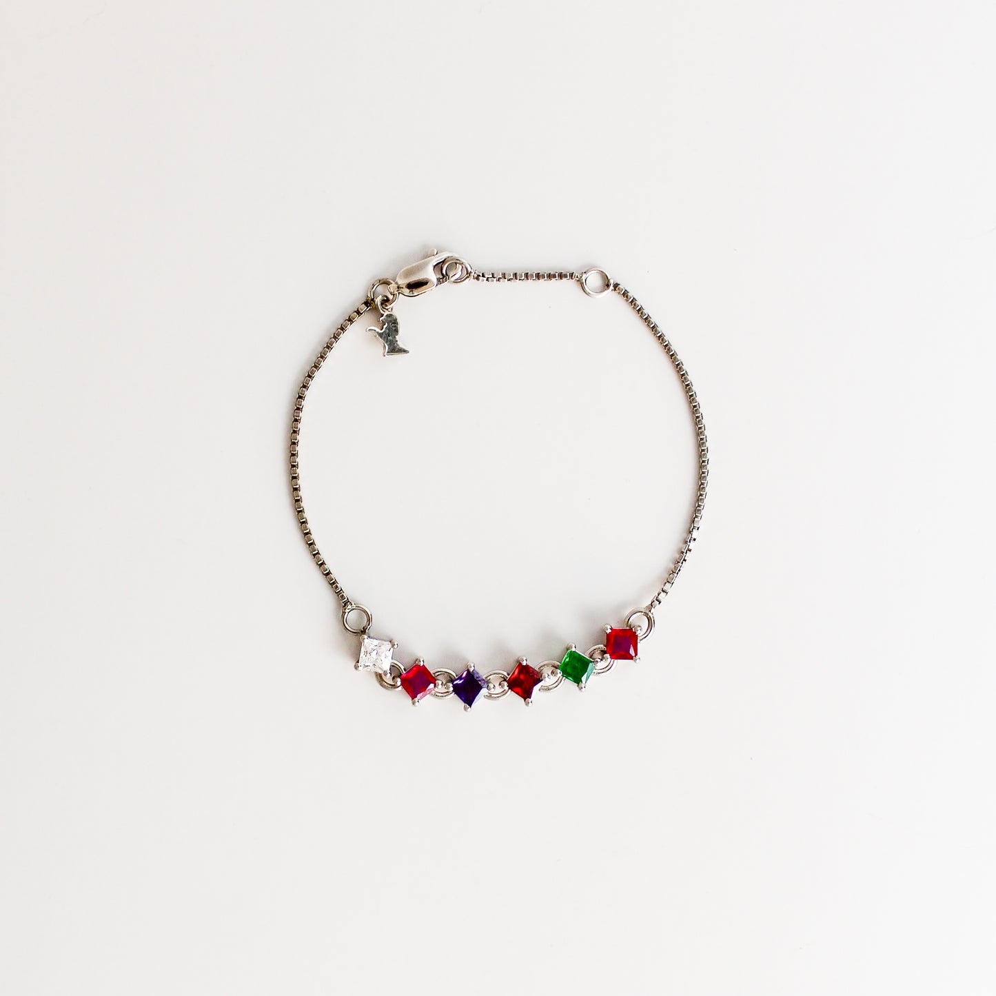 Linked Love Bracelet in sterling silver, acrostic REGARD square-cut CZ stones linked on box chain with bird charm and lobster clasp, Ether Jewelry