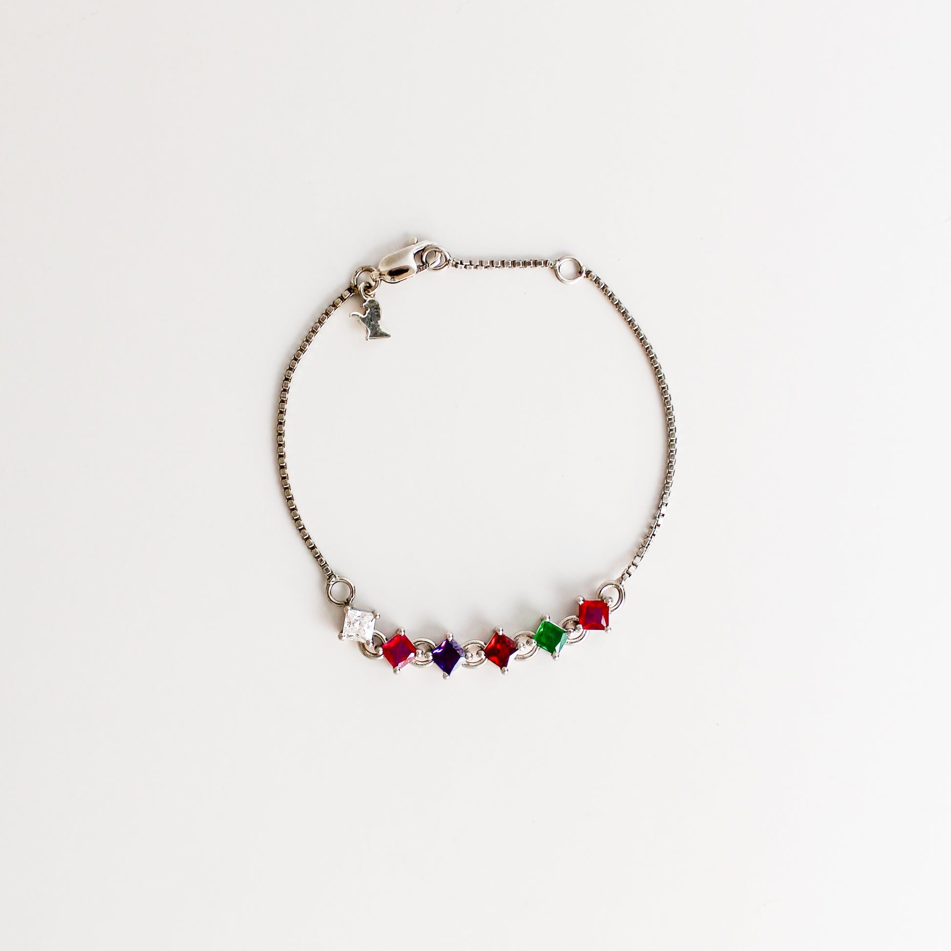 Linked Love Bracelet in sterling silver, acrostic REGARD square-cut CZ stones linked on box chain with bird charm and lobster clasp, Ether Jewelry