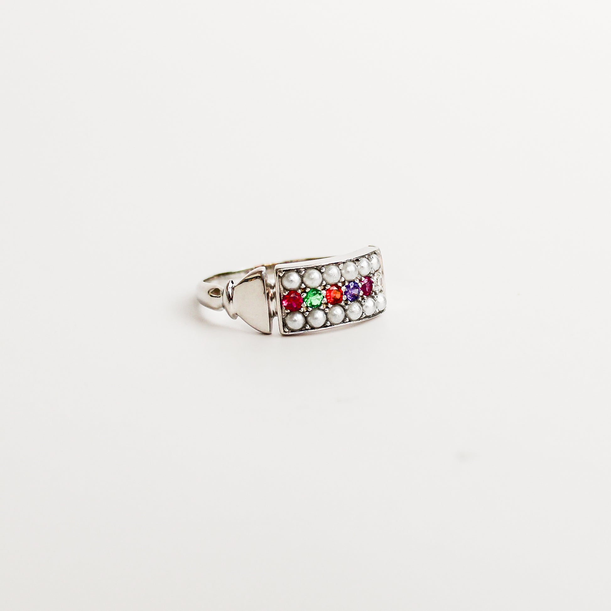 Regent Ring sterling silver side profile, pearl-paved signet face with REGARD acrostic gemstones and barrel ends, Ether Jewelry