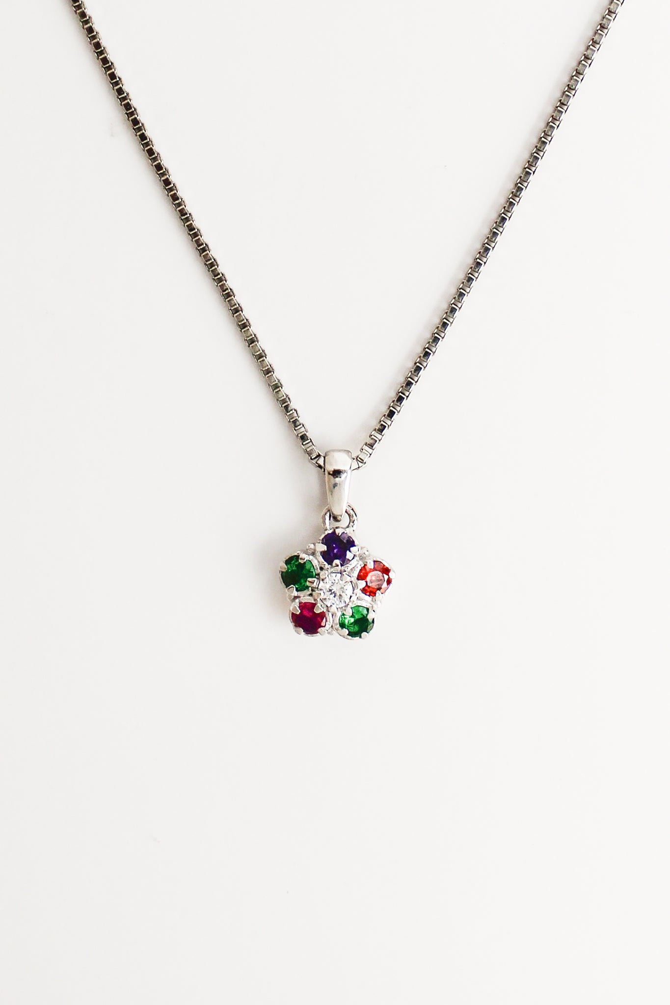 Sterling Silver Regard Bloom box chain Necklace with a multicolored gemstone pendant on a white background, Ether Jewelry