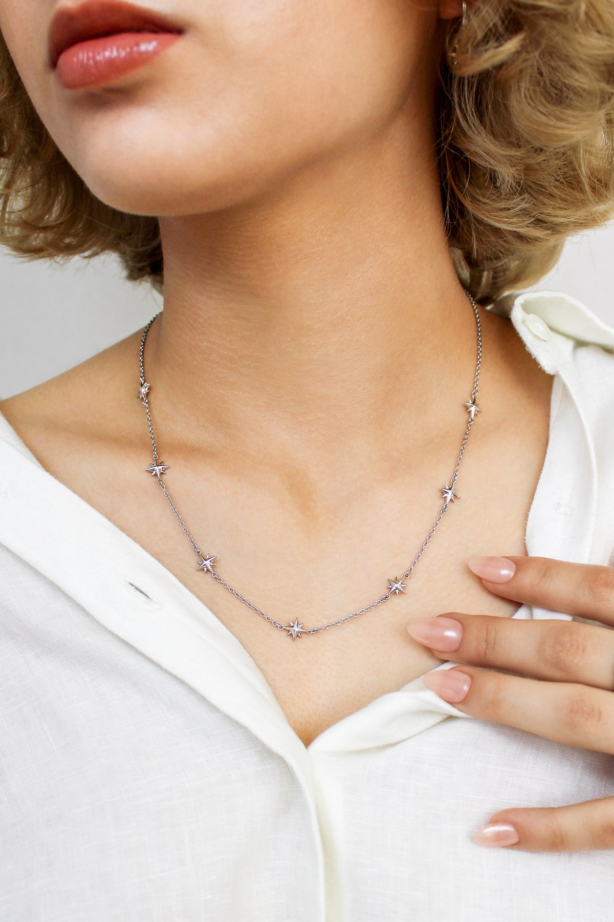 Juno necklace sterling silver, 18 inches, star strand necklace, matching ring, on model, ether jewelry