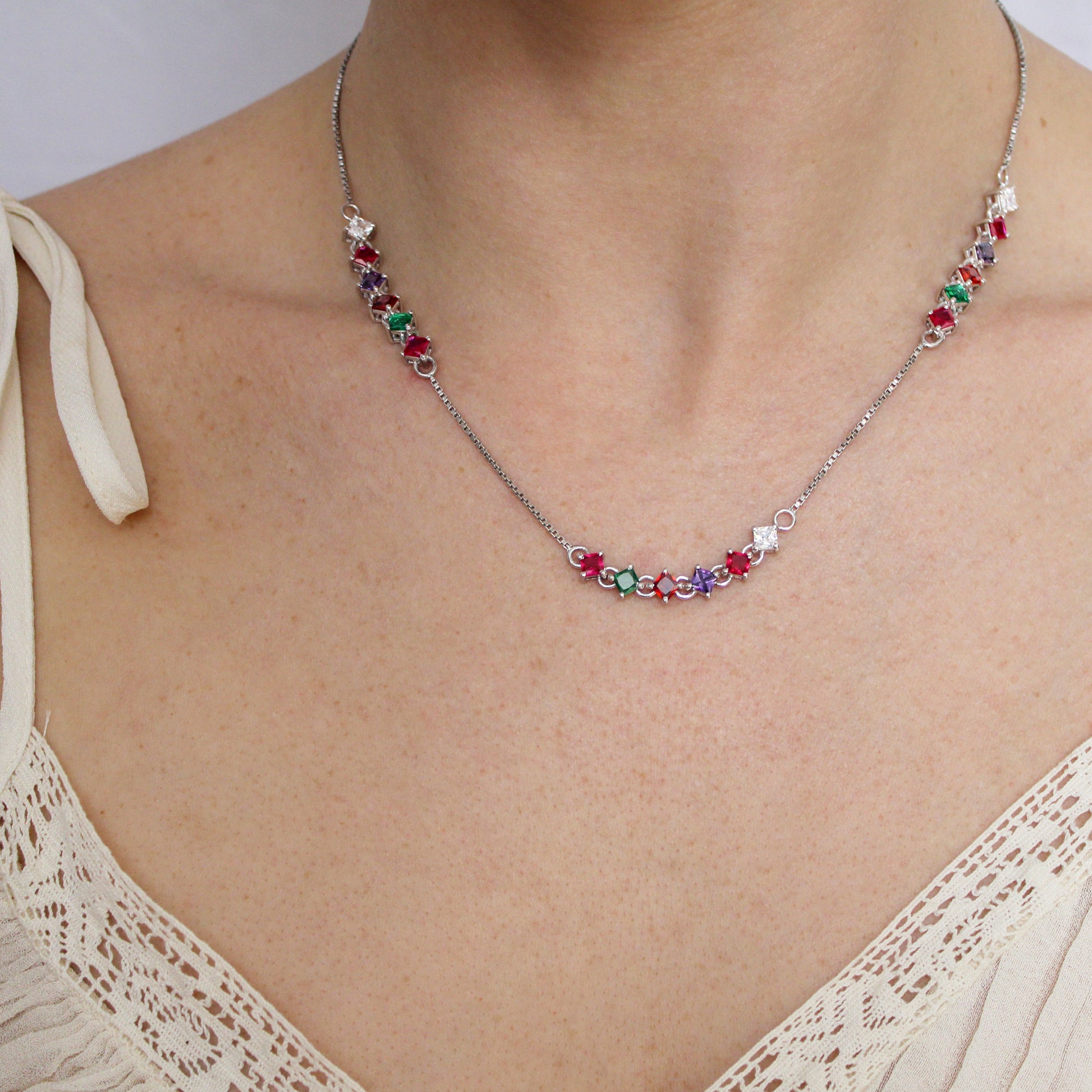 Sterling silver Linked Love Necklace front view on model, continuous acrostic REGARD CZ stone tennis necklace, Ether Jewelry