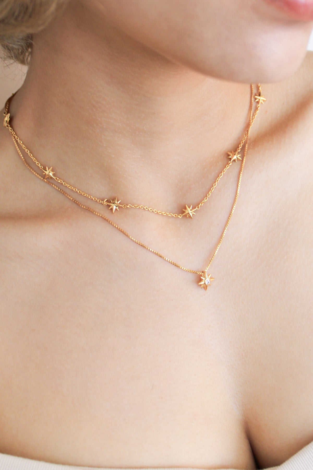 Lucida Necklace and Juno Necklace on model, gold vermeil, eight point star stations, celestial jewelry, ether jewelry