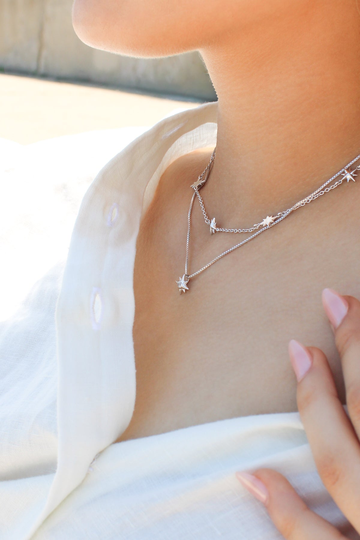 Lucida Necklace and Juno Necklace sterling silver on model, eight point star, celestial jewelry set, ether jewelry