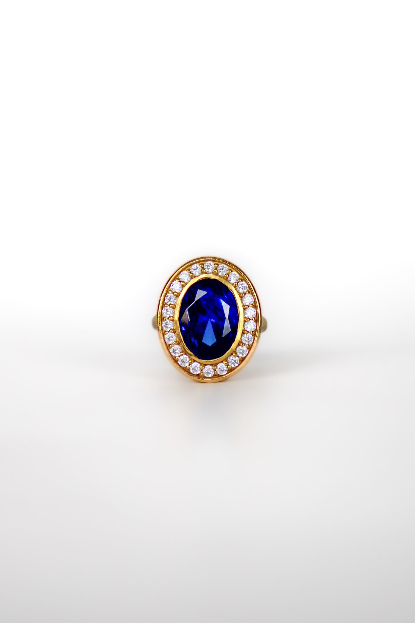 Close-up of The Legacy Ring in gold vermeil with sapphire-toned gemstone inspired by Princess Diana’s iconic jewelry.