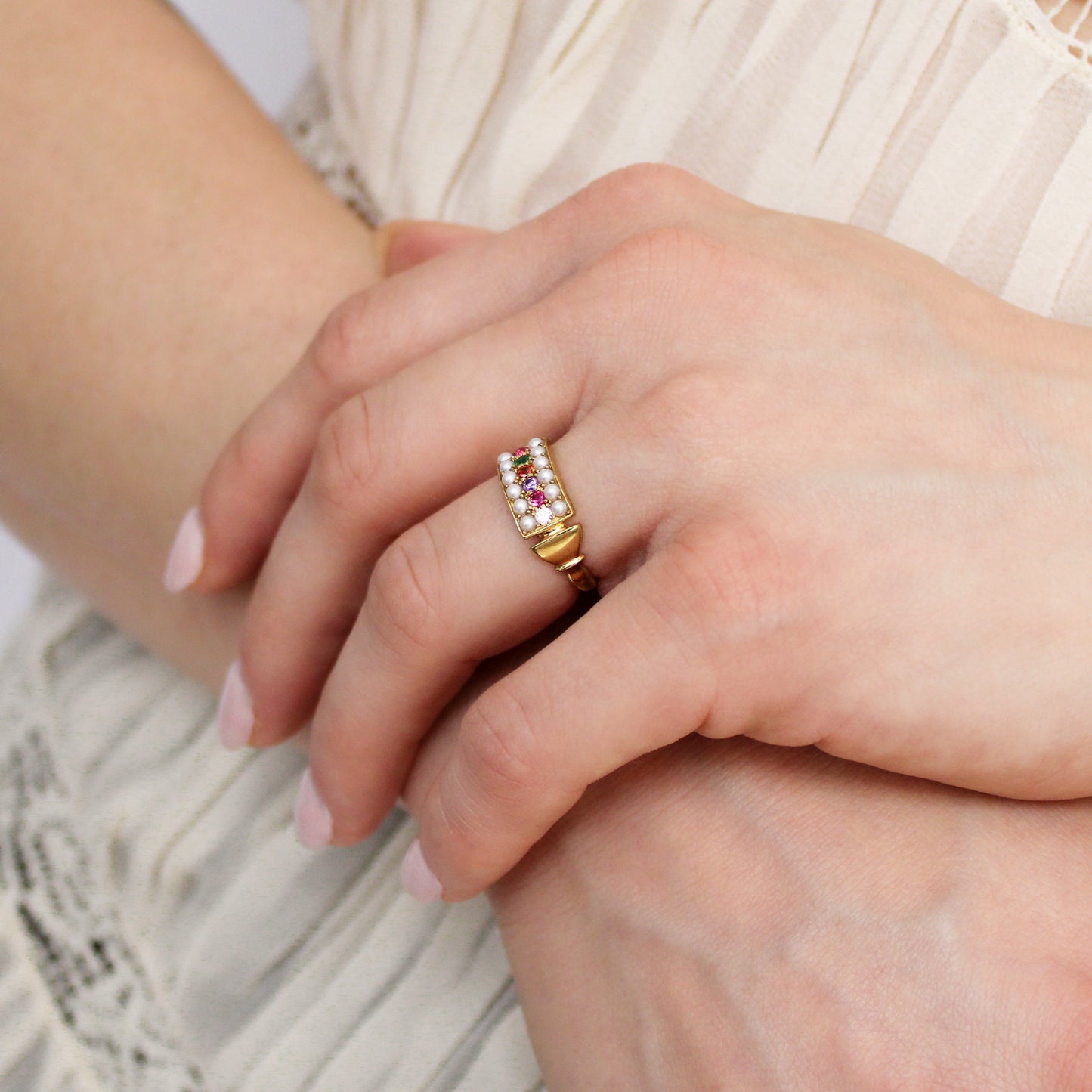 Regent Ring 18k gold vermeil on model holding wrist wearing ring, REGARD acrostic signet jewelry, Ether Jewelry