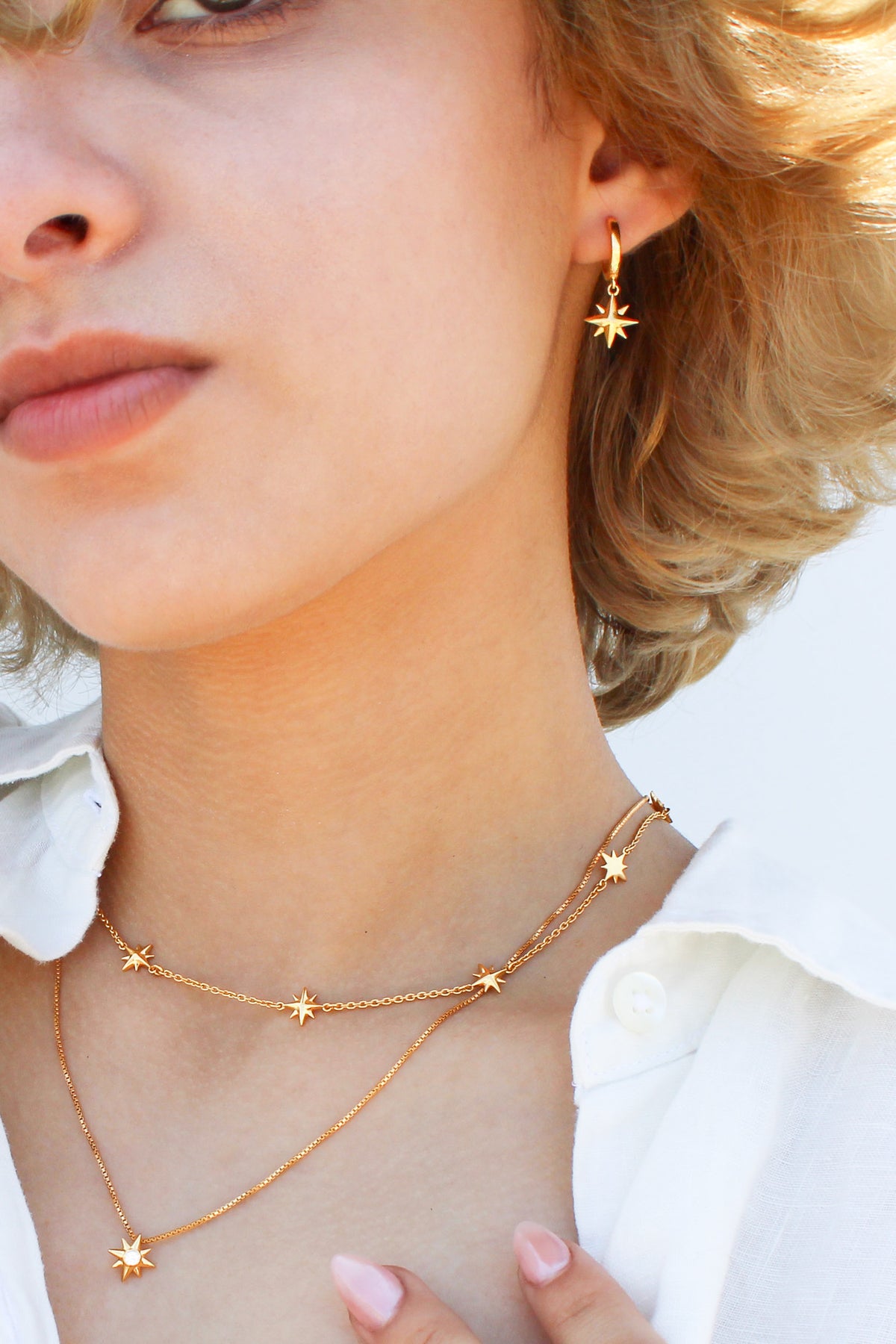 18k gold vermeil Stella Hoops worn in full Juno collection look on model, north star earrings with matching jewelry, Ether Jewelry