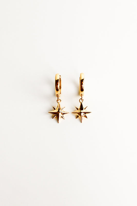 Stella Hoops in 18k gold vermeil, solid north star charm drop huggie hoop earrings, white background, Ether Jewelry