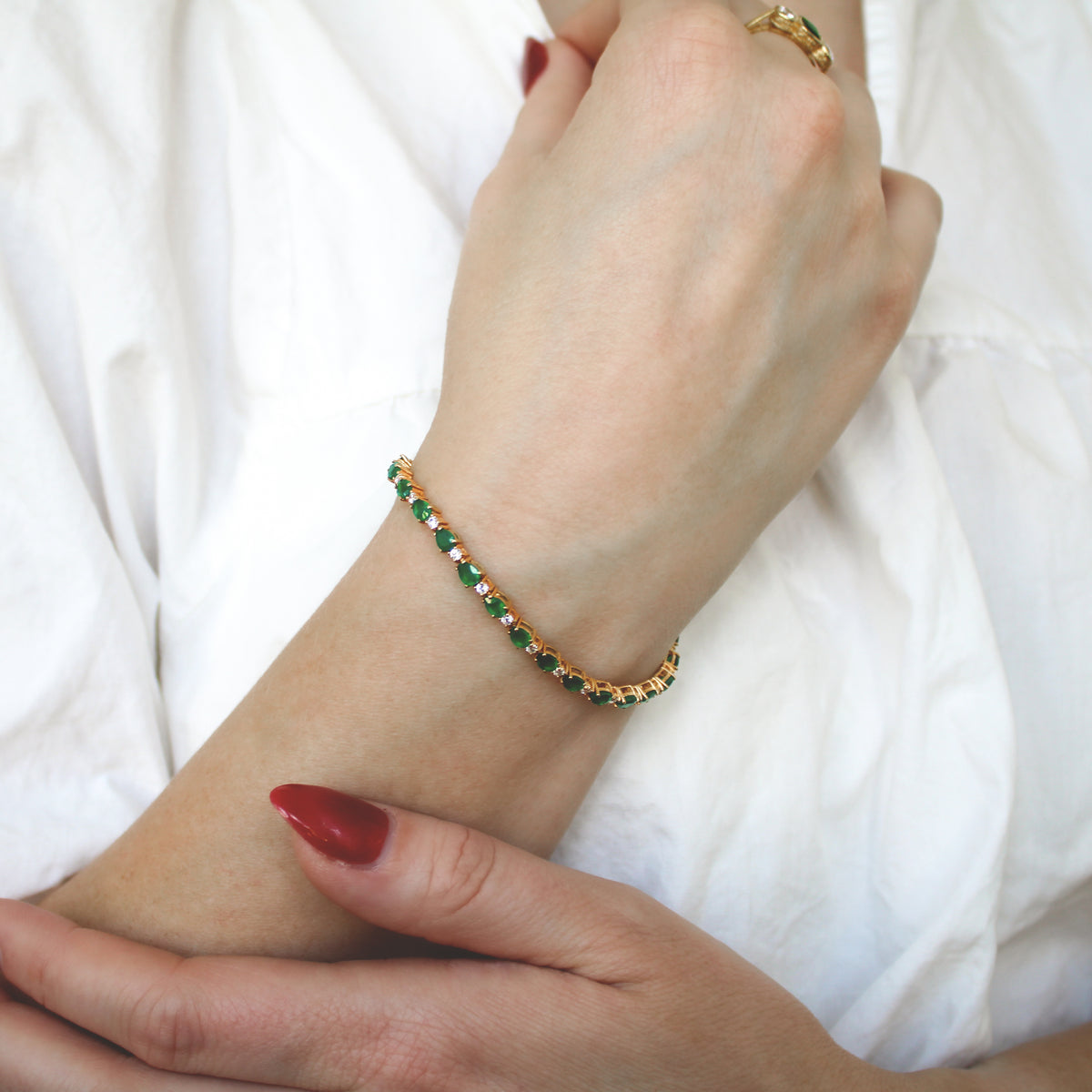 Victorian Court Bracelet in 18k gold vermeil worn on model wrist, alternating green onyx and white CZ tennis bracelet, Ether Jewelry