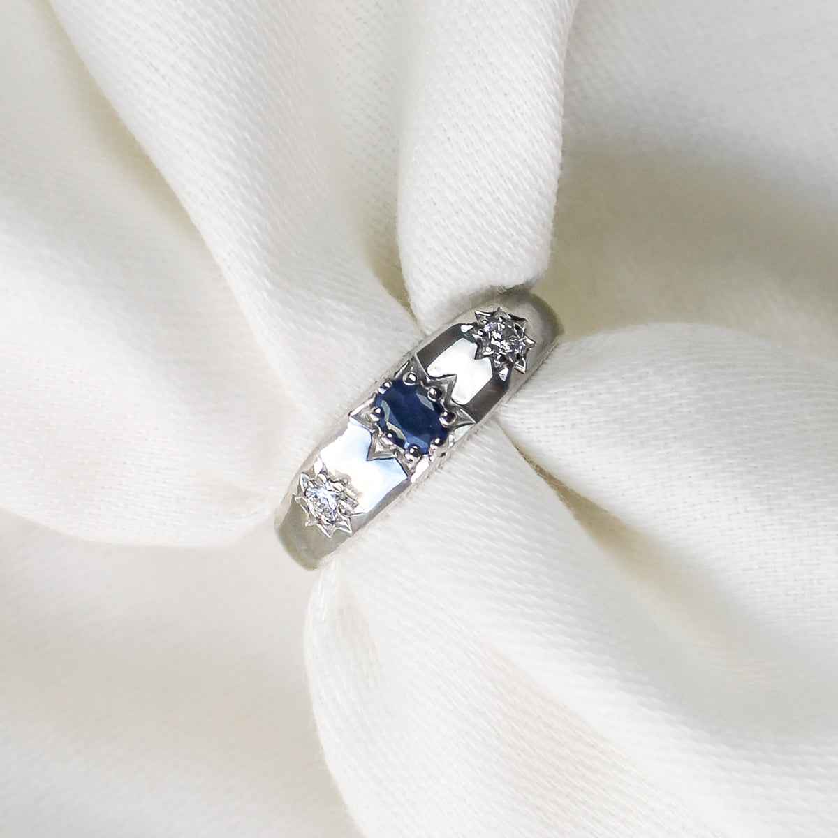 Victorian Roma Ring sterling silver, three stone design, middle sapphire gemstone, two side accent diamond, star engravings, pulled through white fabric, ether jewelry