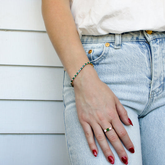 Victorian Court Bracelet in 18k gold vermeil worn on model wrist, alternating green onyx and white CZ tennis bracelet, Ether Jewelry